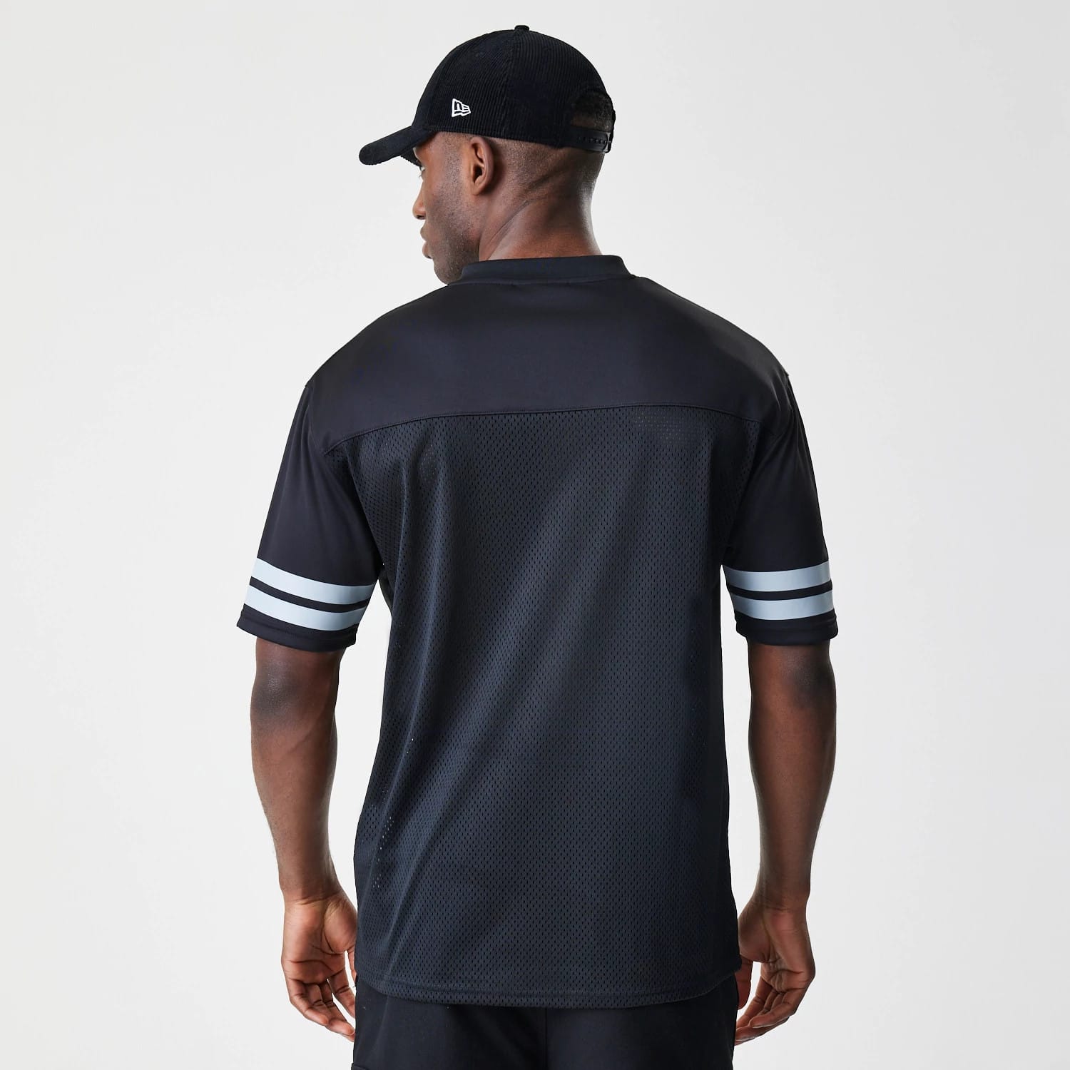 The Male model is wearing Las Vegas Raiders Script NFL Mesh Black Jersey 2