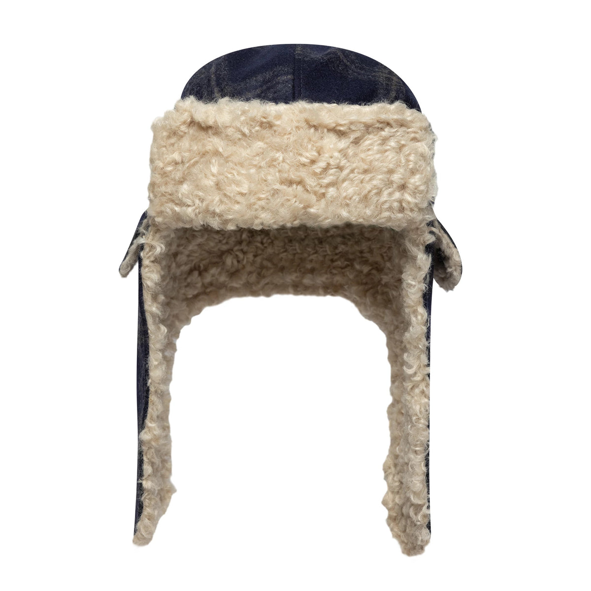 New Era Loden Navy Trapper Hat, front view showing cream faux shearling lining covering the face opening and ear flaps, with a navy exterior at the top and edges of the design.