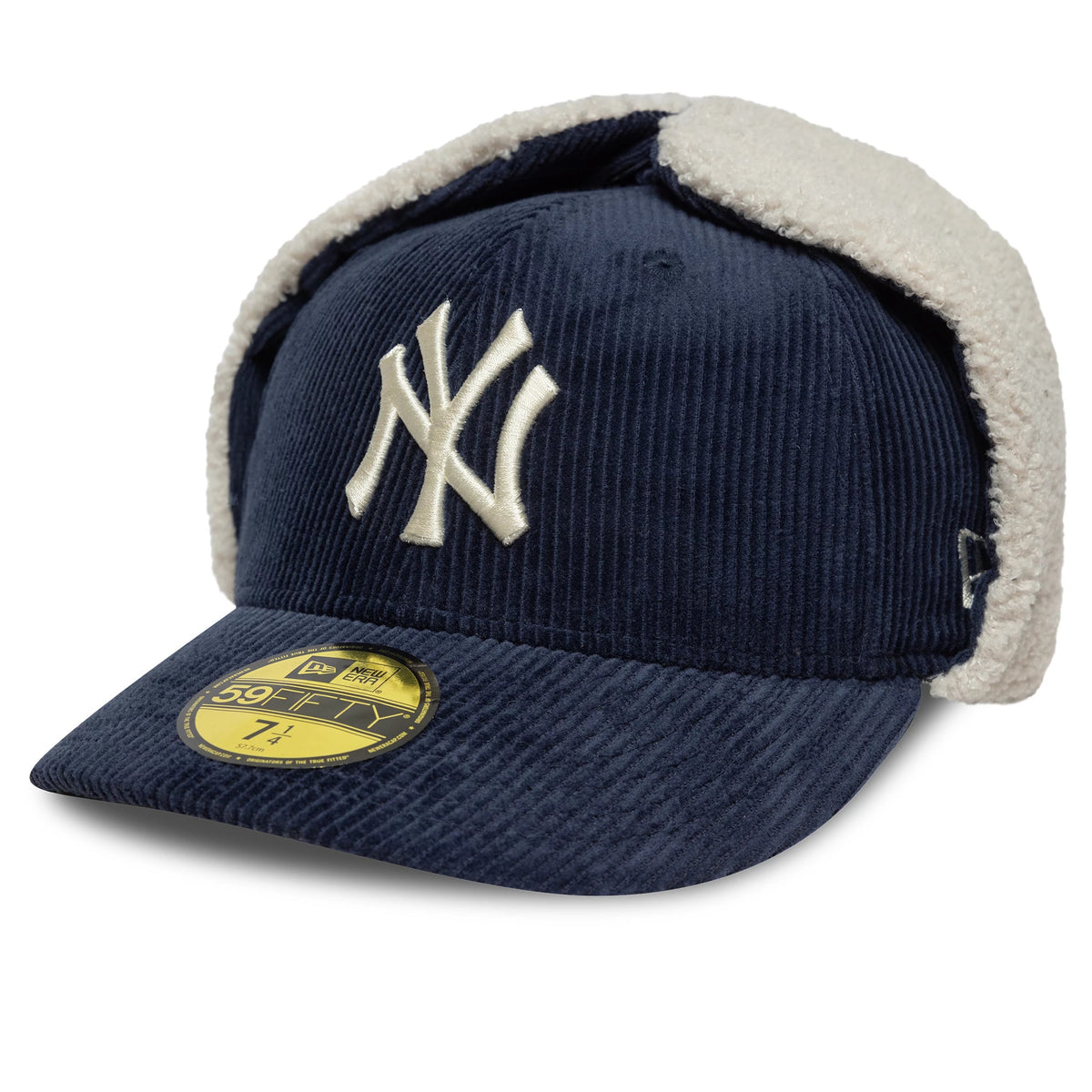 New York Yankees MLB Cord Navy Dogear New Era 59FIFTY Fitted Cap, three-quarter view showing the raised white embroidered NY logo on the front panel, gold 59FIFTY size sticker on the navy corduroy visor, and white fleece dogear flaps.