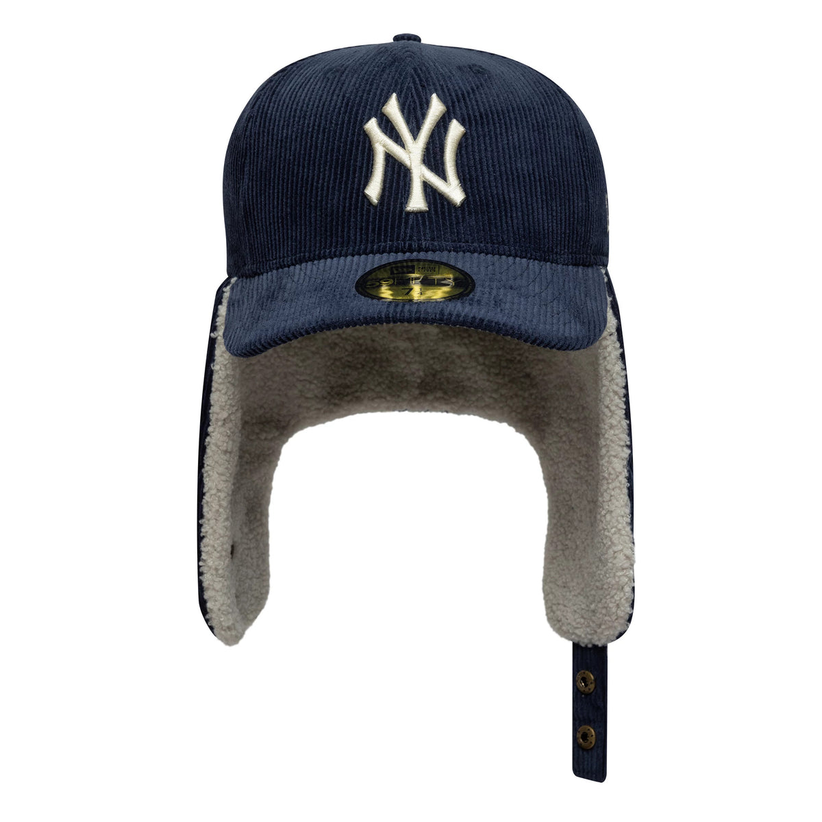 New York Yankees MLB Cord Navy Dogear New Era 59FIFTY Fitted Cap, front view showing the raised white embroidered NY logo on the navy corduroy crown, with a gold 59FIFTY size sticker on the visor and plush-lined ear flaps.