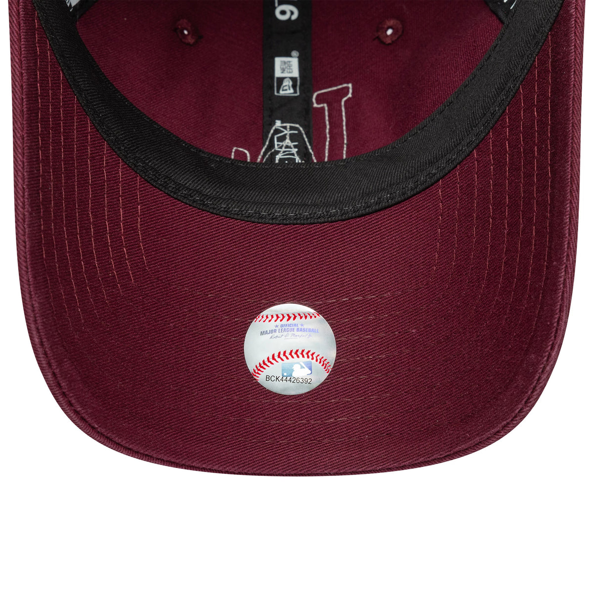 LA Dodgers Womens MLB Boucle Dark Red New Era 9TWENTY Adjustable Cap, inside view showing the black sweatband, printed white logo under the crown, and a holographic sticker on the dark red undervisor.
