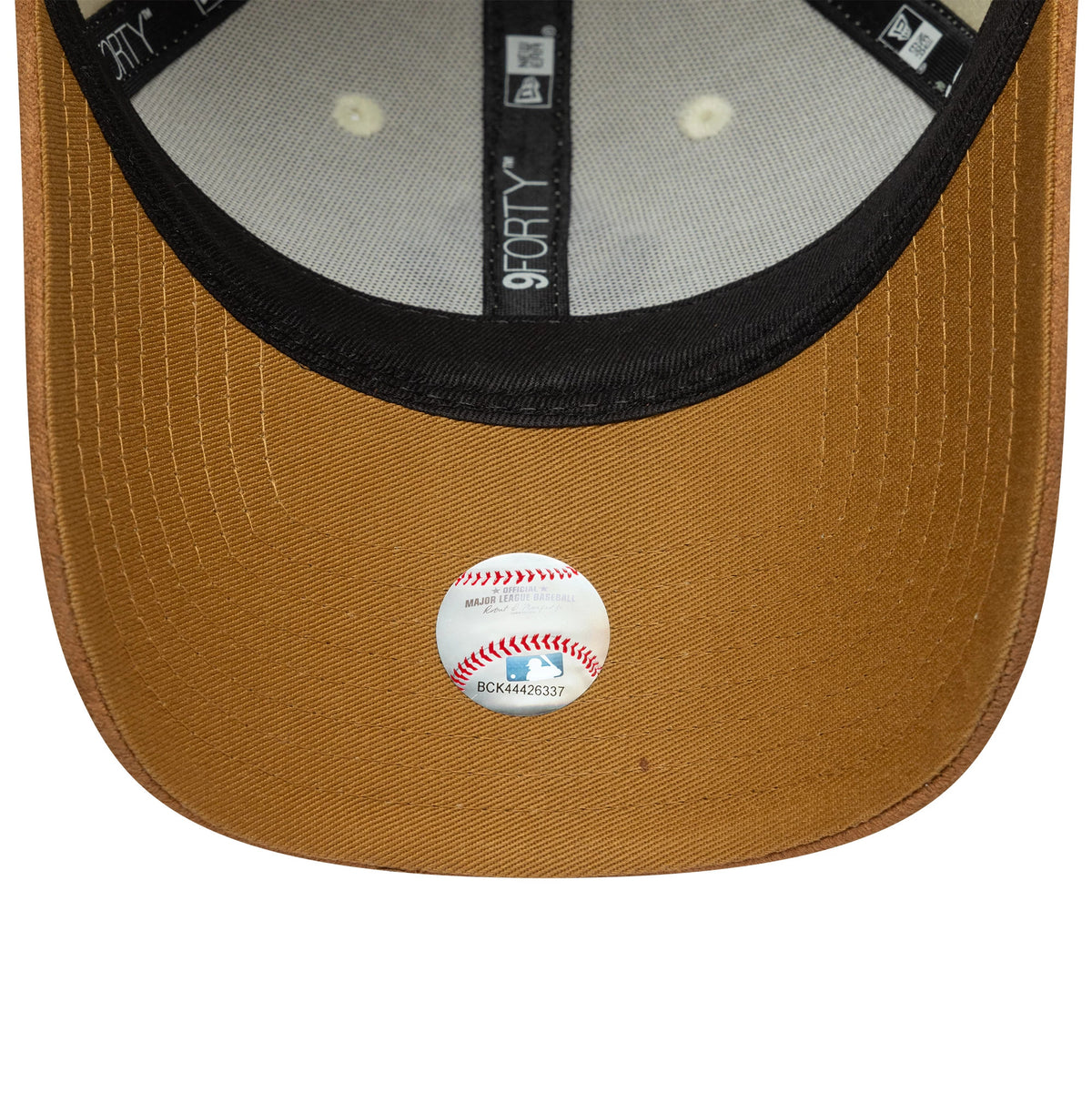 New York Yankees Womens MLB Faux Suede Cream New Era 9FORTY Adjustable Cap, inside view showing grey taping with the 9FORTY logo, a black sweatband, and a grey undervisor featuring an MLB authentication sticker near the front.