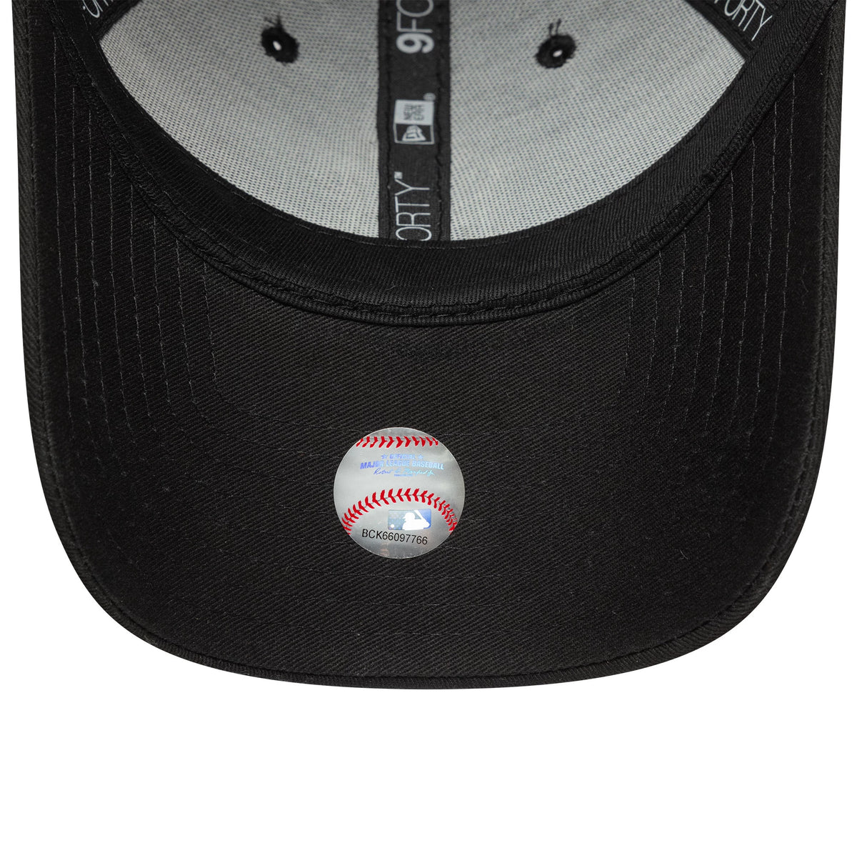 New York Yankees MLB Team Outline Black New Era 9FORTY Adjustable Cap, inside view showing the black sweatband, grey taping with white 9FORTY branding, and a round MLB holographic sticker on the underside of the black curved visor.