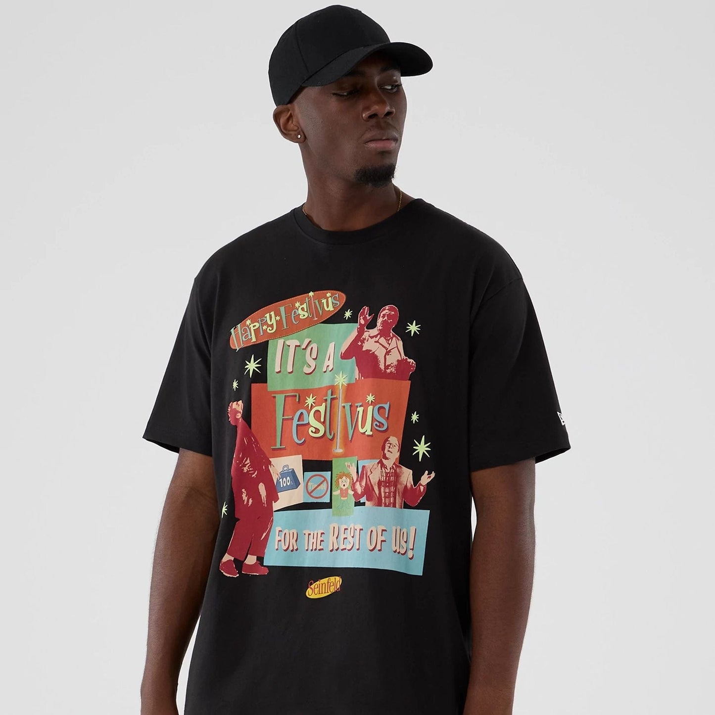 The Male model is wearing Seinfeld Lifestyle Graphic Black T-Shirt 7