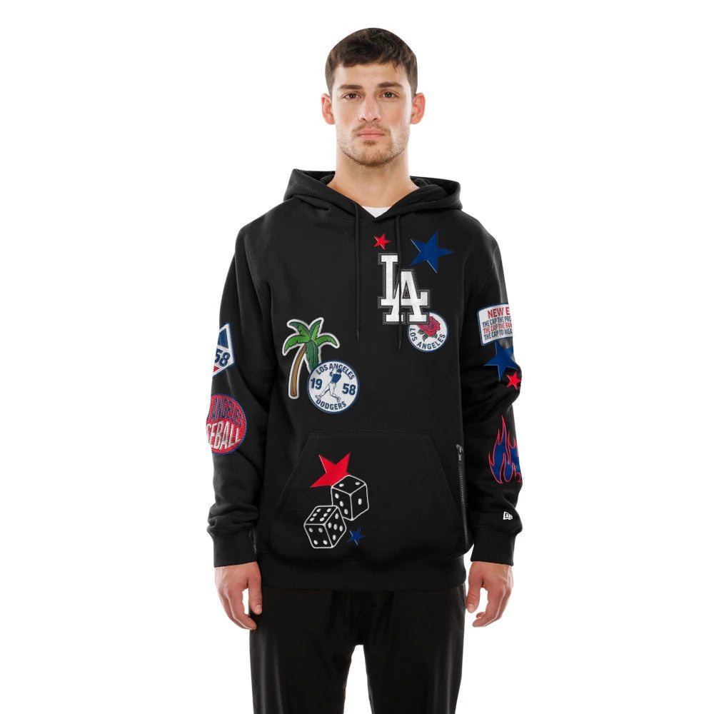 New Era LA Dodgers MLB x Uptown Threads Black Pullover Hoodie, front view on-model showing embroidered LA logo on chest, colourful patches including stars and palm tree on the sleeves, and red star on the front pocket.