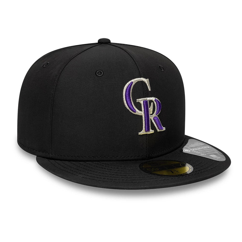Colorado Rockies MLB Gore-Tex Black New Era 59FIFTY Fitted Cap, front view showing the raised silver and purple embroidered CR logo on the black front panel, with a flat black visor and gold 59FIFTY size sticker.