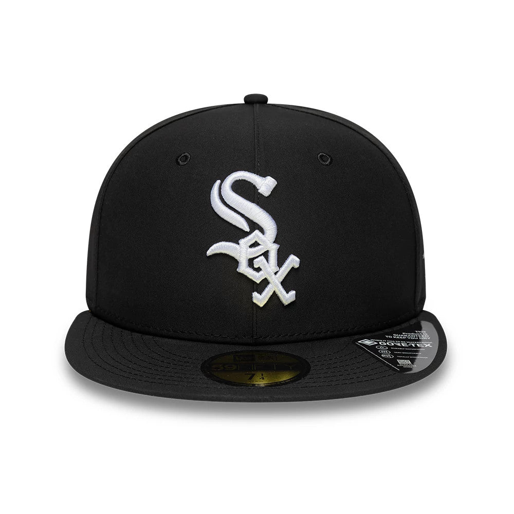 Chicago White Sox MLB Gore-Tex Black New Era 59FIFTY Fitted Cap, front view showing the raised white Sox logo embroidered on the structured black crown, with a gold 59FIFTY size sticker on the flat black visor.