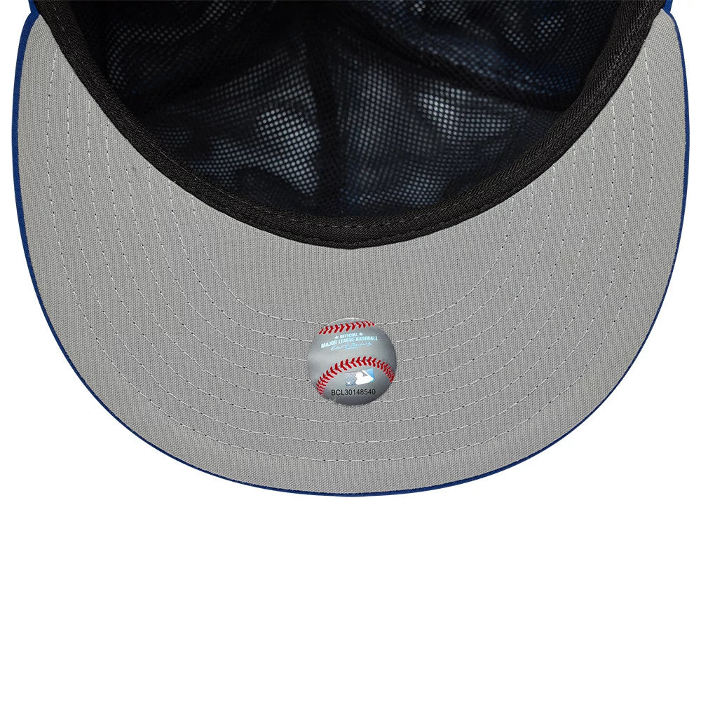 New York Mets MLB Gore-Tex Blue New Era 59FIFTY Fitted Cap, inside view showing the black interior lining, grey undervisor, and a baseball graphics sticker centred on the underside.