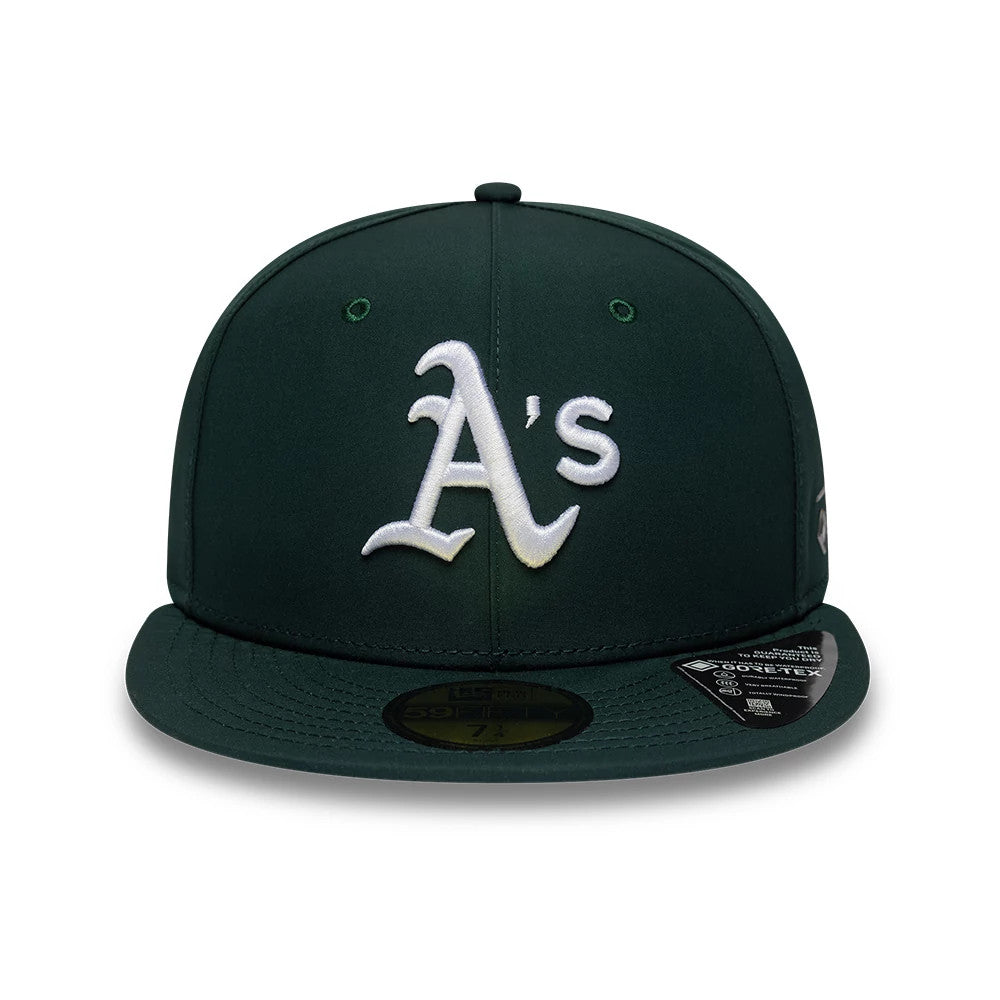 Athletics MLB Gore-Tex Dark Green New Era 59FIFTY Fitted Cap, front view showing the white raised embroidered A’s logo on the structured dark green crown, with a flat visor and gold 59FIFTY size sticker on top.
