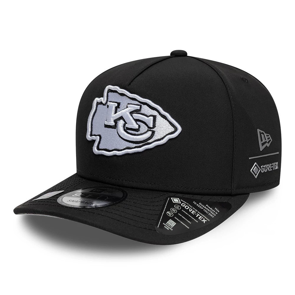 Kansas City Chiefs NFL Gore-Tex Black New Era 9FIFTY A-Frame Snapback Adjustable Cap, front view showing a raised white and grey Chiefs logo embroidered on the front panel, black visor with a 9FIFTY size sticker and Gore-Tex logo on the left side.