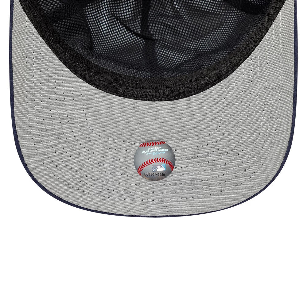 New York Yankees MLB Gore-Tex White New Era 9SEVENTY Stretch Snap Adjustable Cap, inside view showing the black mesh sweatband, grey undervisor, and a baseball-themed MLB sticker at the centre.