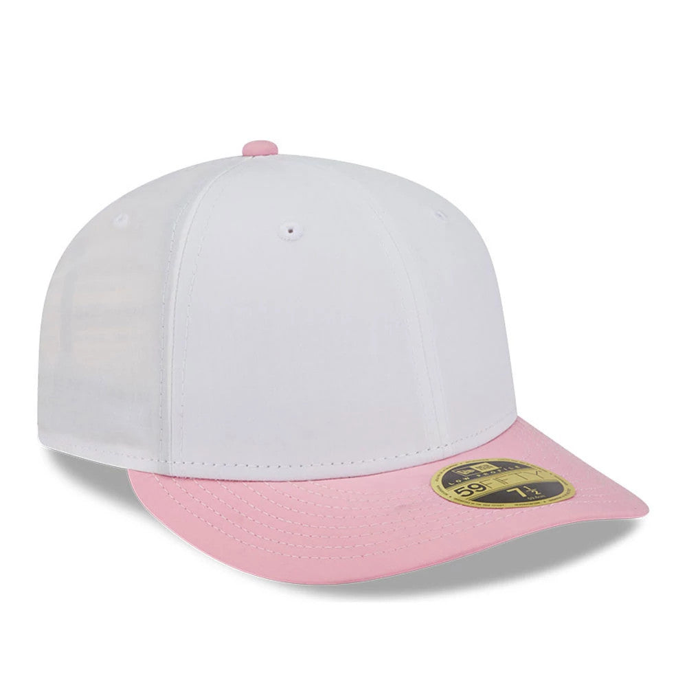 New Era Open White & Pink Low Profile 59FIFTY Fitted Cap, three-quarter view showing a flat pink visor with a gold 59FIFTY size sticker, a white structured crown, and pink top button.
