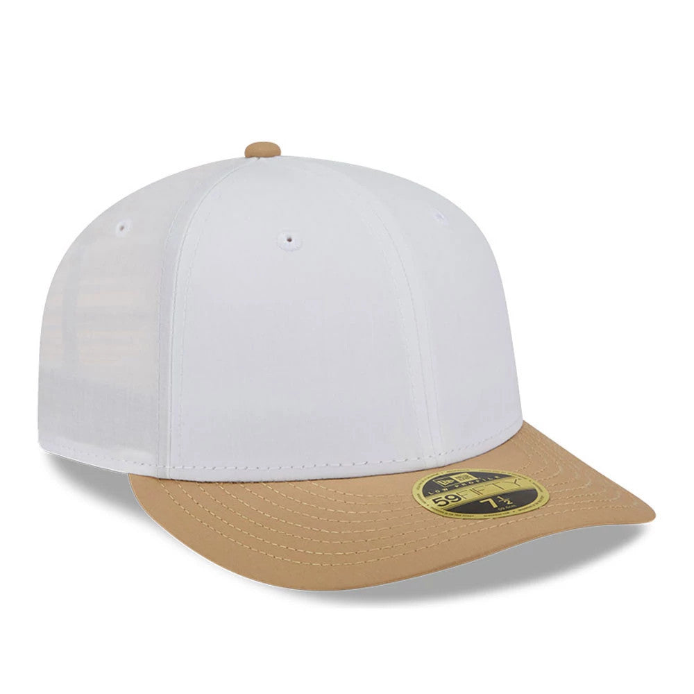 New Era Open White & Beige Low Profile 59FIFTY Fitted Cap, three-quarter view showing a beige flat visor with a gold 59FIFTY size sticker, white structured crown and matching beige top button.