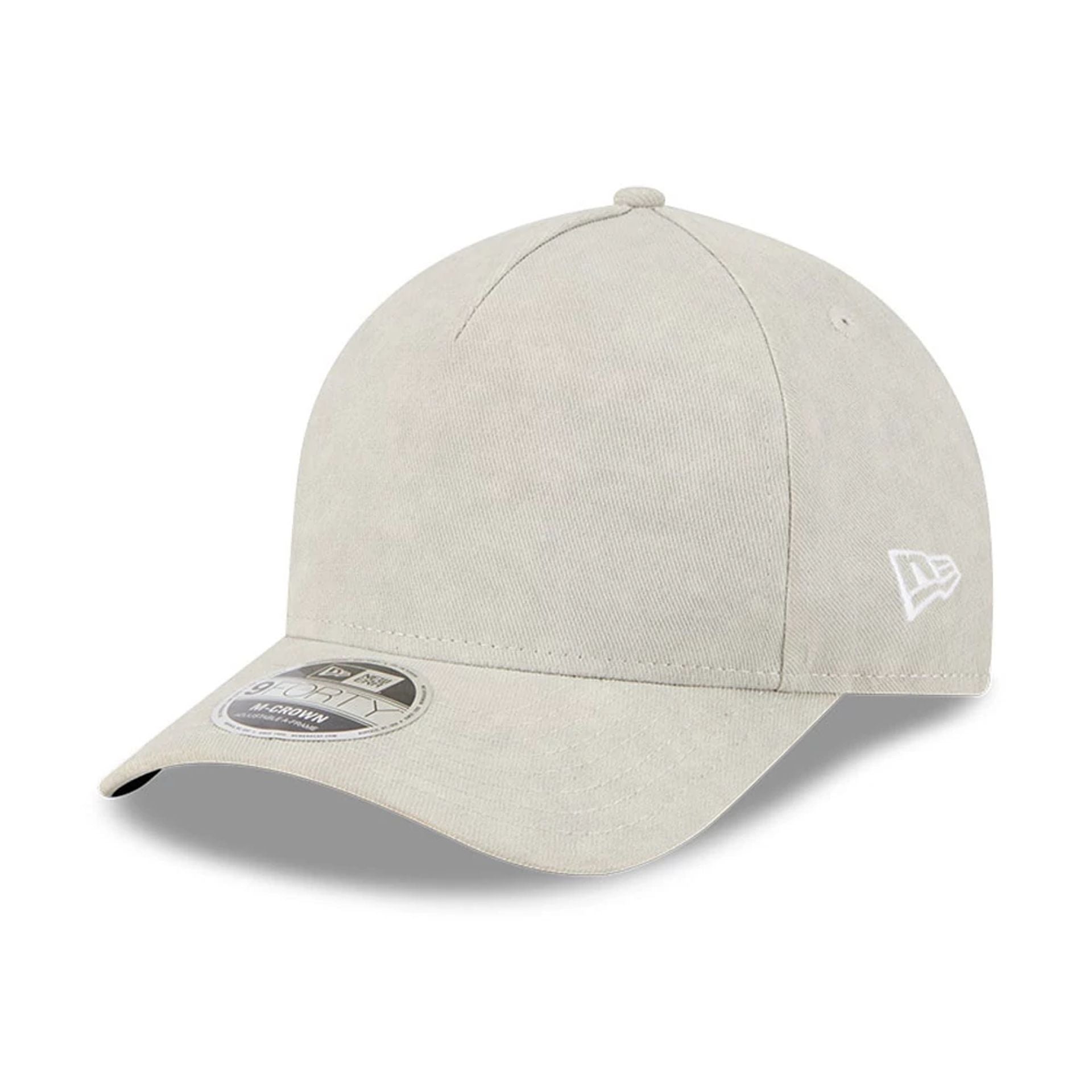 This is a New Era Light Beige 9FORTY M-Crown A-Frame Adjustable Cap 1