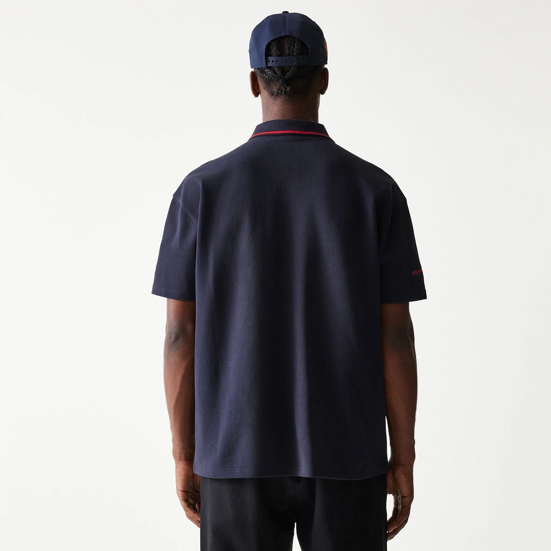 The Male model is wearing Red Bull Racing Dark Blue Polo T-Shirt 2