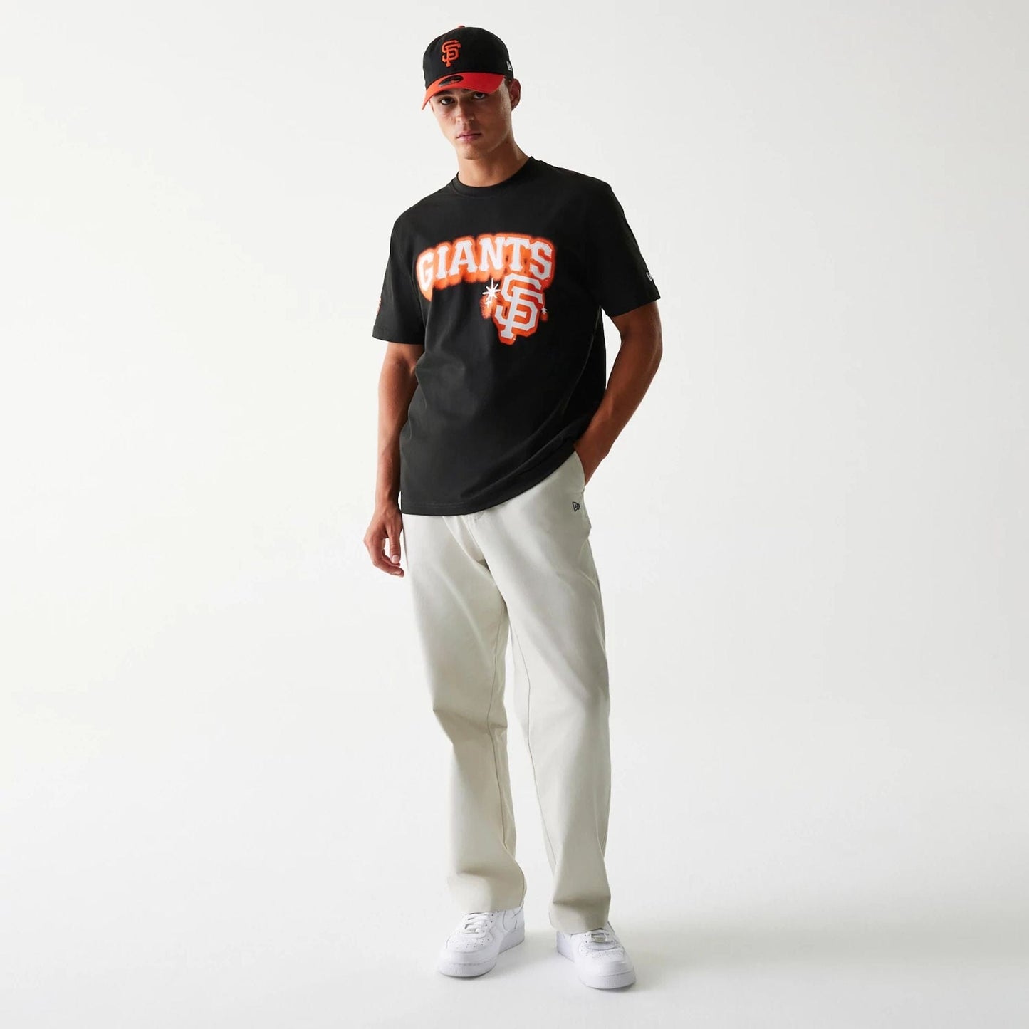 The Male model is wearing San Francisco Giants OVO x MLB Black T-Shirt 8