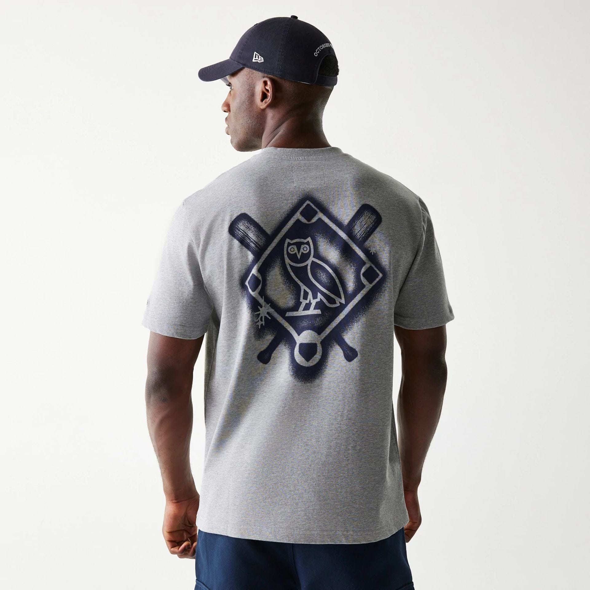 The Male model is wearing New York Yankees OVO x MLB Grey T-Shirt 2