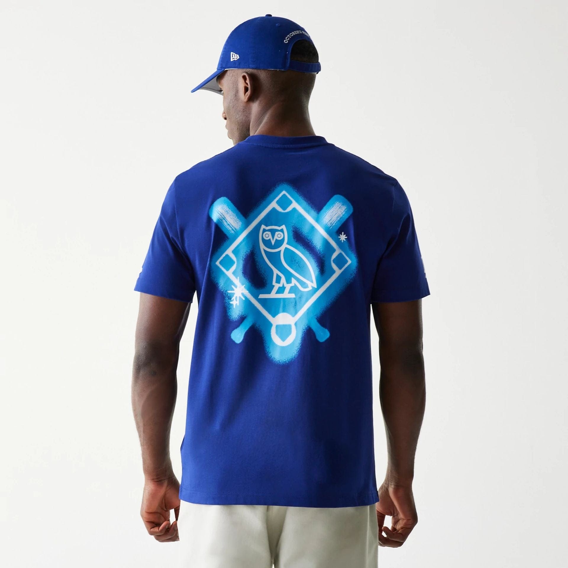 The Male model is wearing LA Dodgers OVO x MLB Dark Blue T-Shirt 2