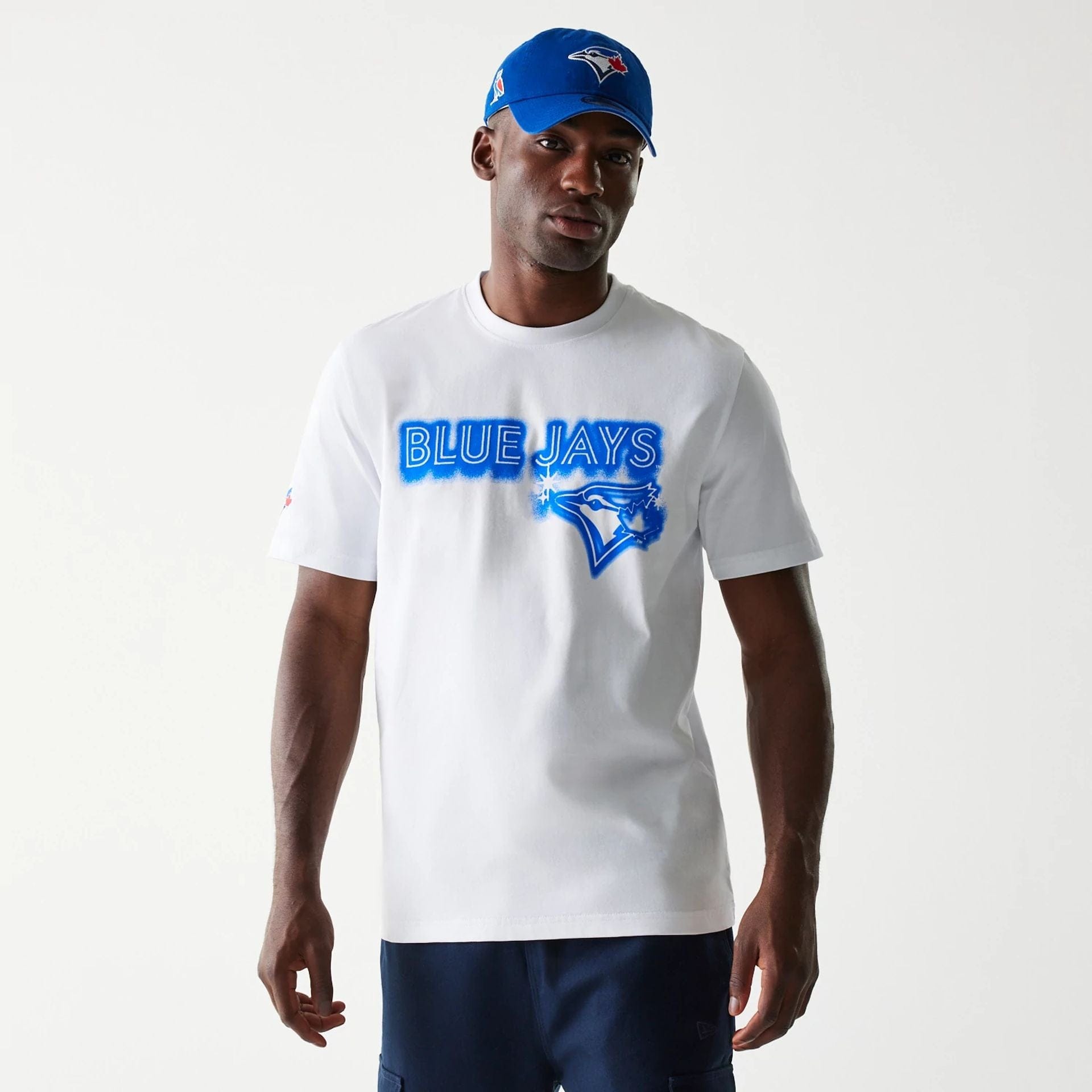 The Male model is wearing Toronto Blue Jays OVO x MLB White T-Shirt 1