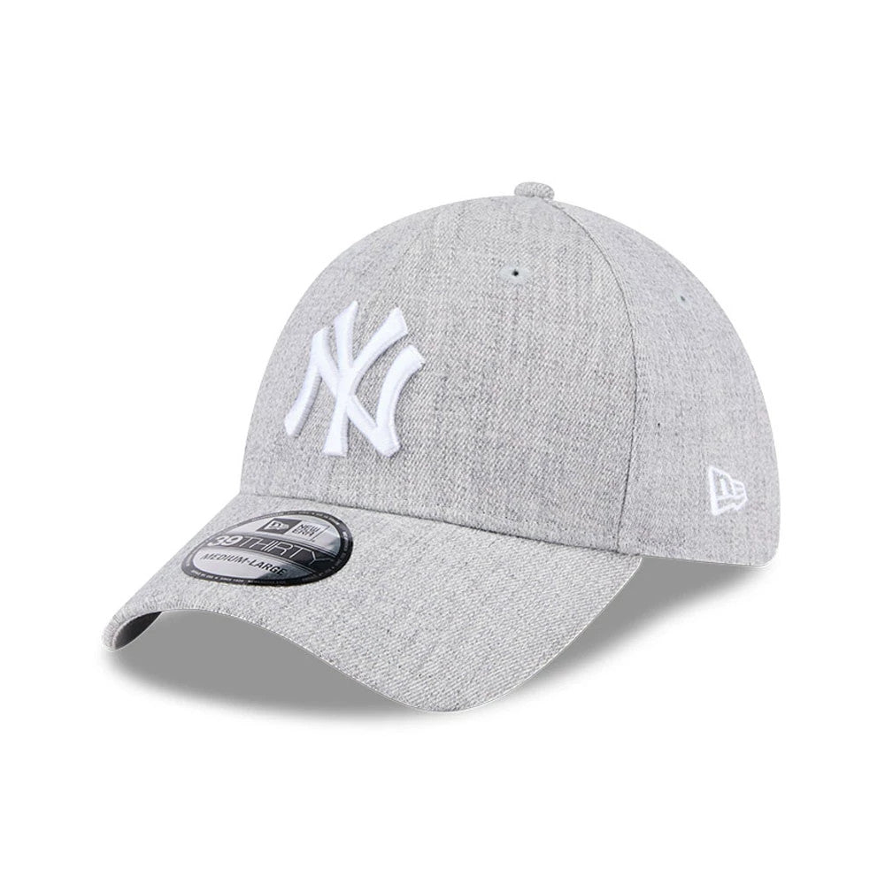 New York Yankees MLB Heather Grey New Era 39THIRTY Stretch Fit Cap, three-quarter view showing the white embroidered NY logo on the front panel, curved grey visor with a 39THIRTY size sticker, and New Era flag logo on the left side.