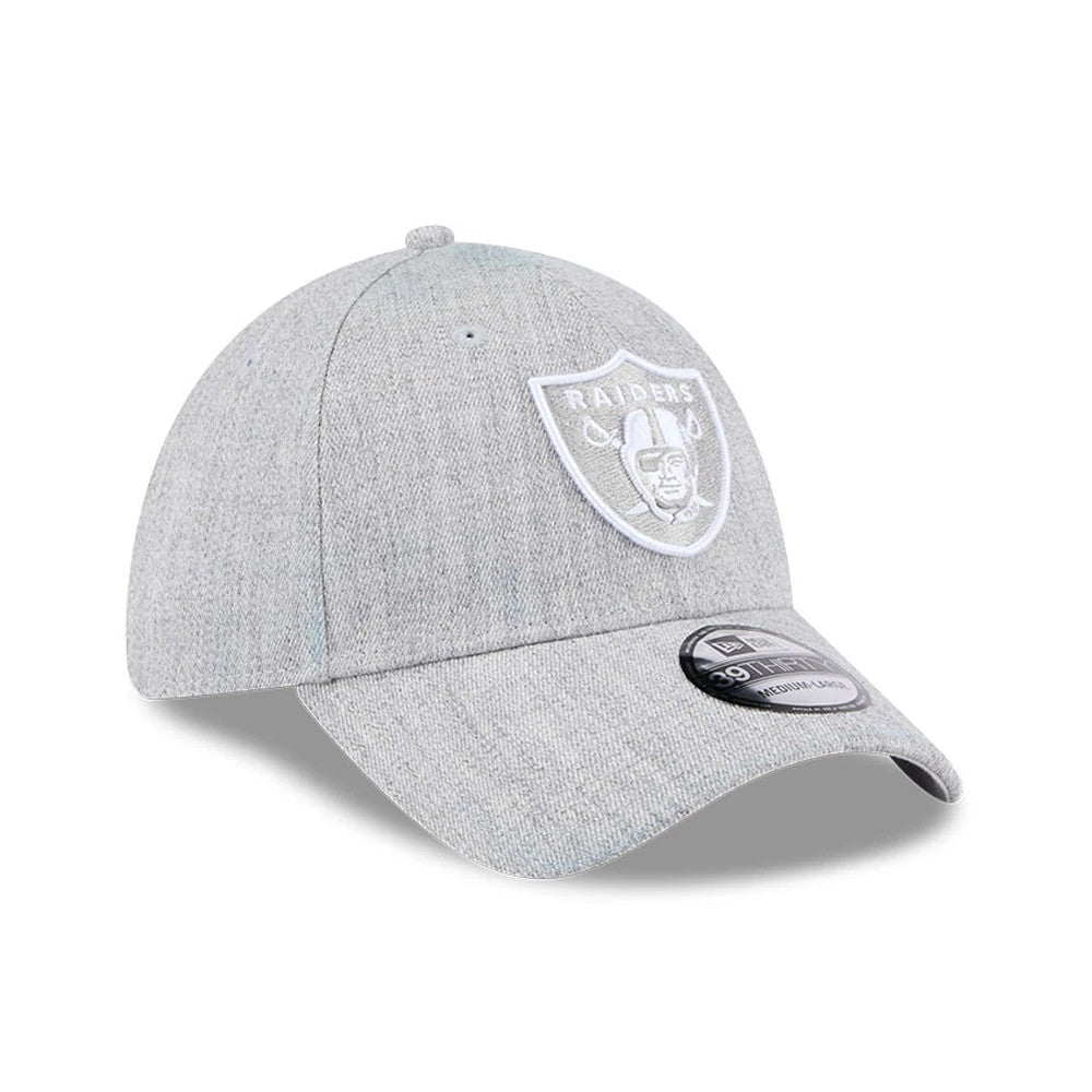 Las Vegas Raiders NFL Heather Grey New Era 39THIRTY Stretch Fit Cap, three-quarter view showing the raised white Raiders shield logo on the front panel, a curved grey visor and the 39THIRTY size sticker on the top.