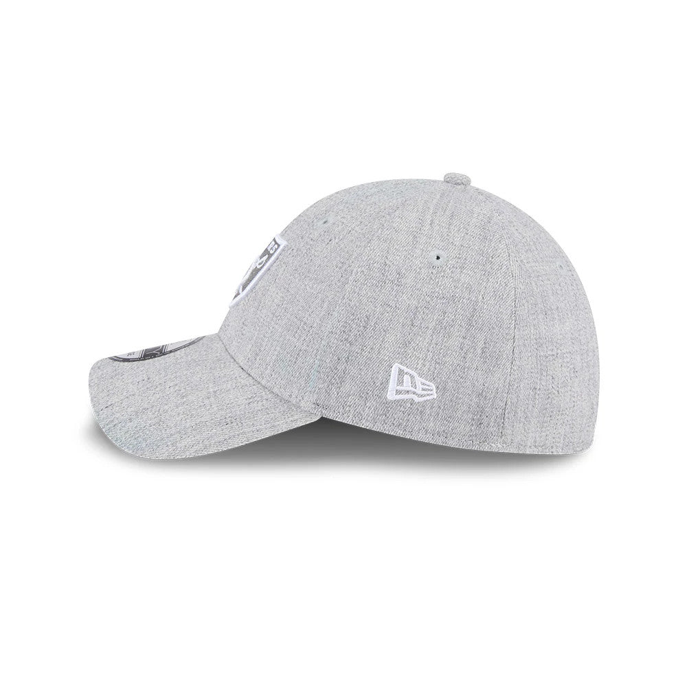 Las Vegas Raiders NFL Heather Grey New Era 39THIRTY Stretch Fit Cap, side view showing a white embroidered New Era flag logo on the left side of the structured heather grey crown, with a curved visor.