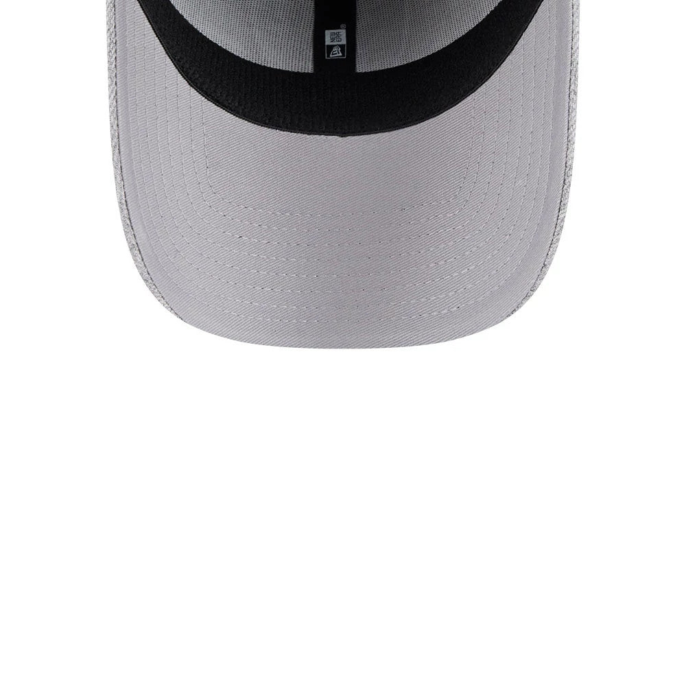 Las Vegas Raiders NFL Heather Grey New Era 39THIRTY Stretch Fit Cap, inside view showing black sweatband, grey undervisor, and internal taping with the New Era logo extending across the structured panels.