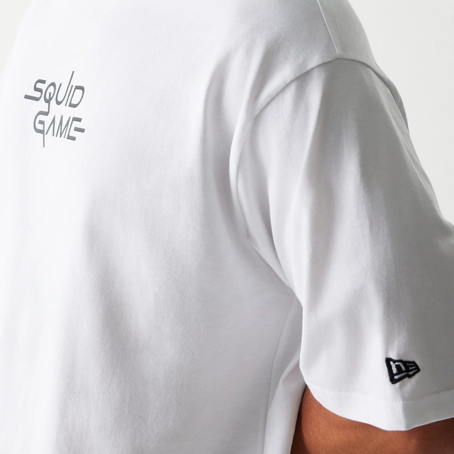 The Male model is wearing Netflix Squid Game White Oversized T-Shirt 7