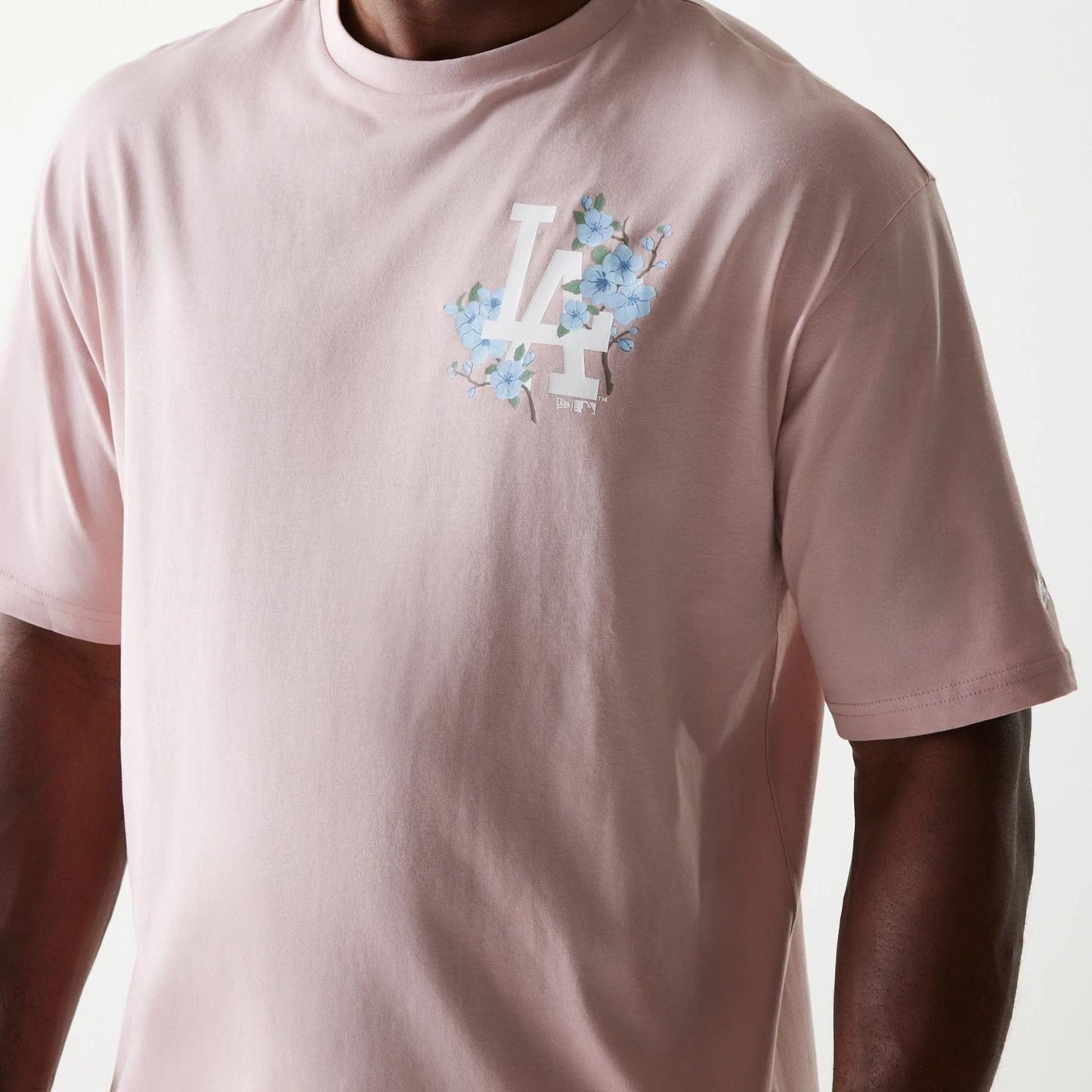 The Male model is wearing LA Dodgers MLB Floral Pastel Pink Oversized T-Shirt 7