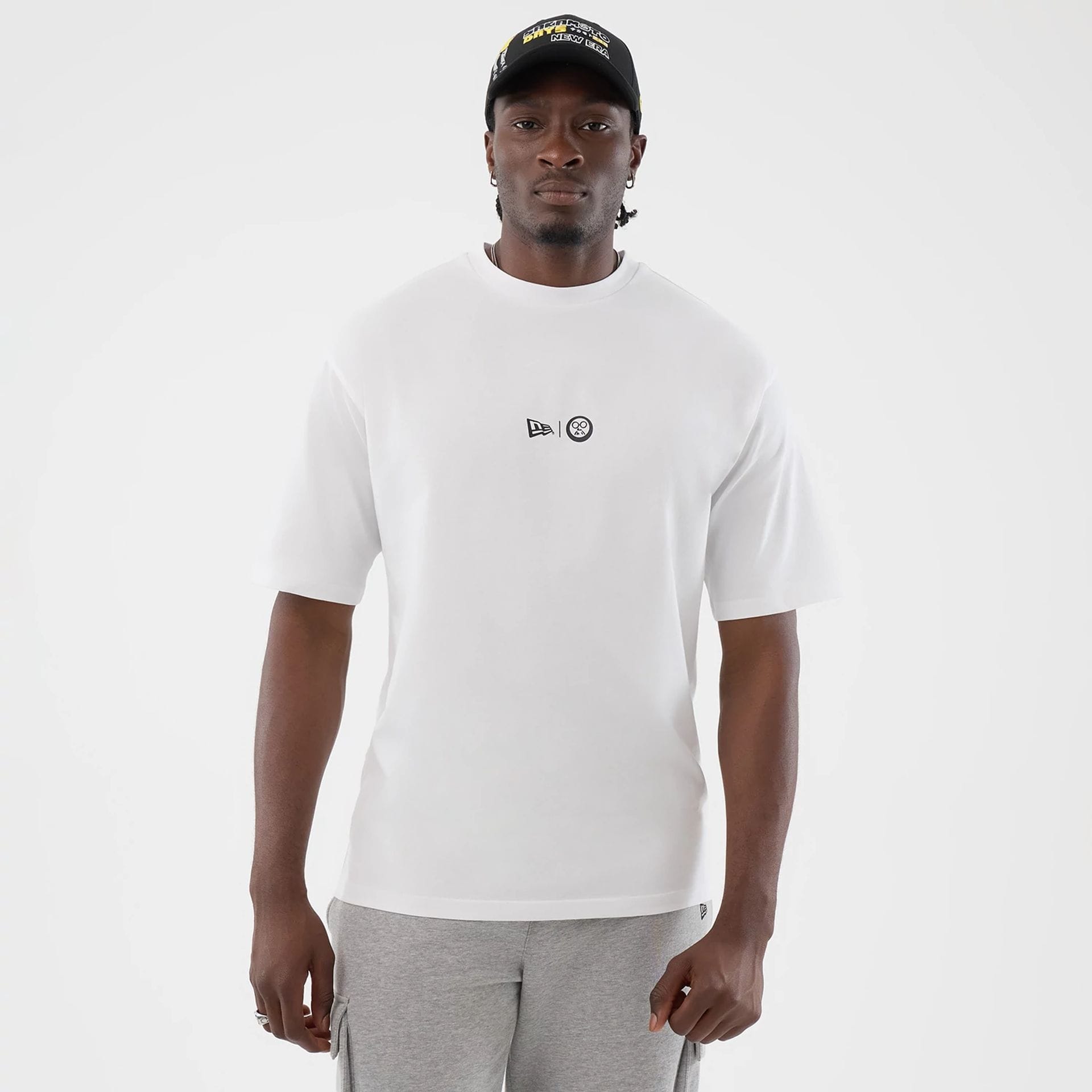 The Male model is wearing Sakamoto Days Netflix White T-Shirt 1