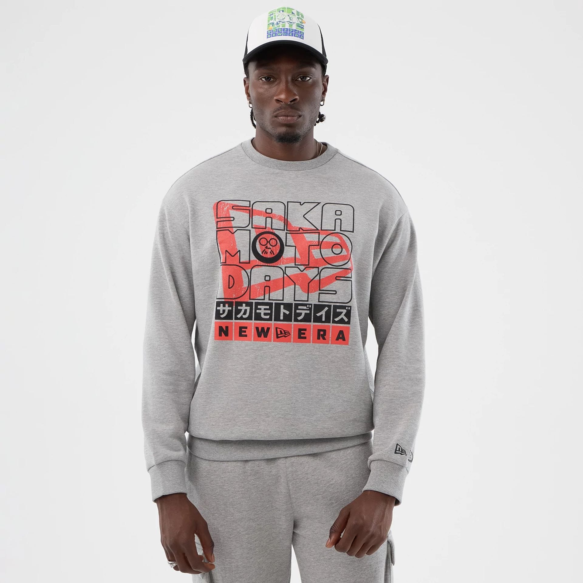 The Male model is wearing Sakamoto Days Netflix Grey Crew Neck Sweater 1