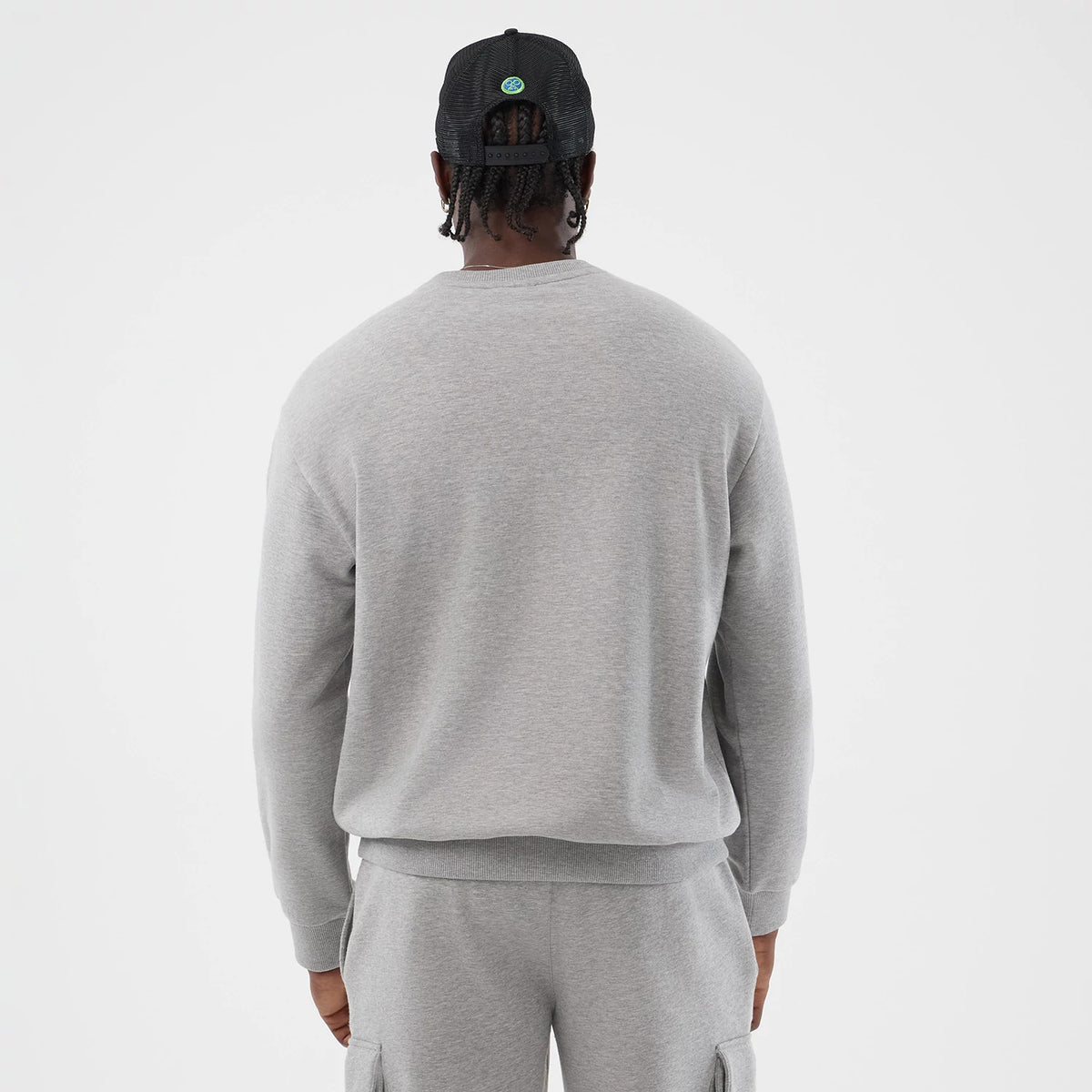 The Male model is wearing Sakamoto Days Netflix Grey Crew Neck Sweater 2