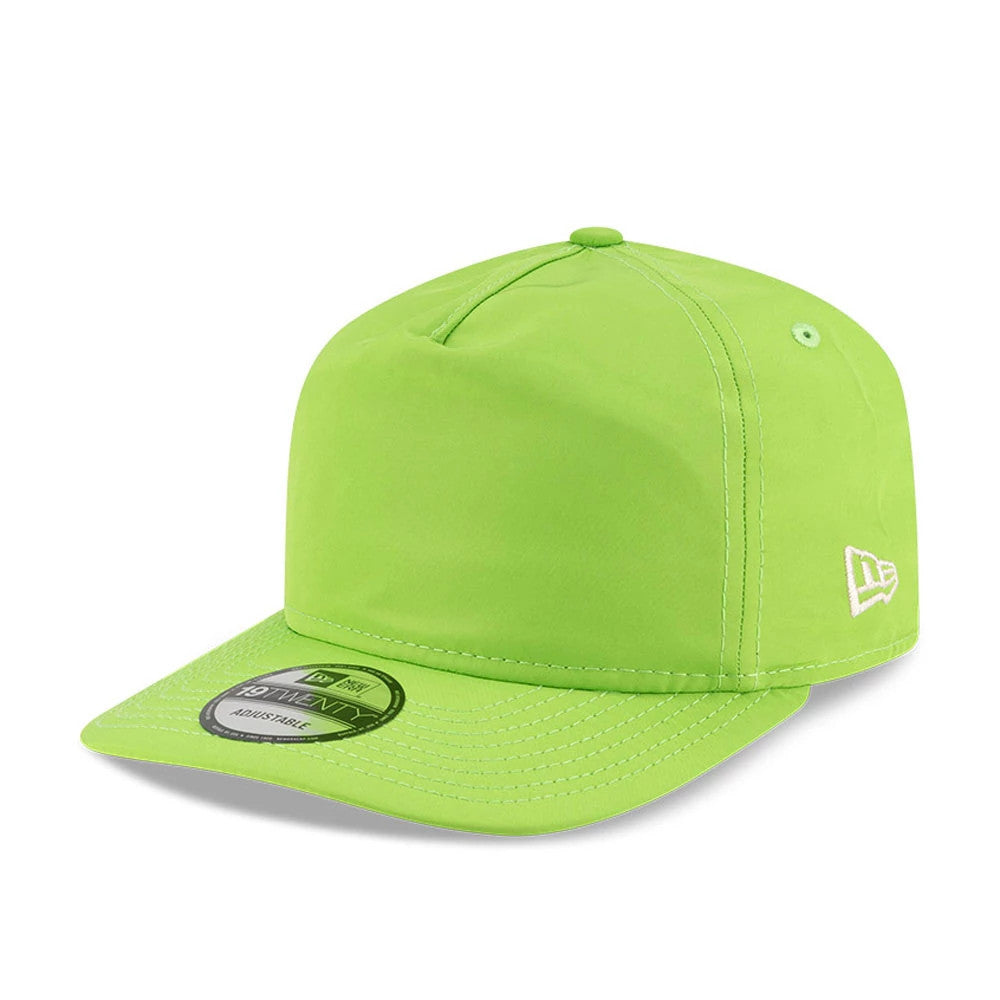 New Era Green 19TWENTY Adjustable Cap, front three-quarter view showing the white New Era flag logo on the left side, green flat visor with matching 19TWENTY size sticker, and structured crown with matching top button and eyelets.
