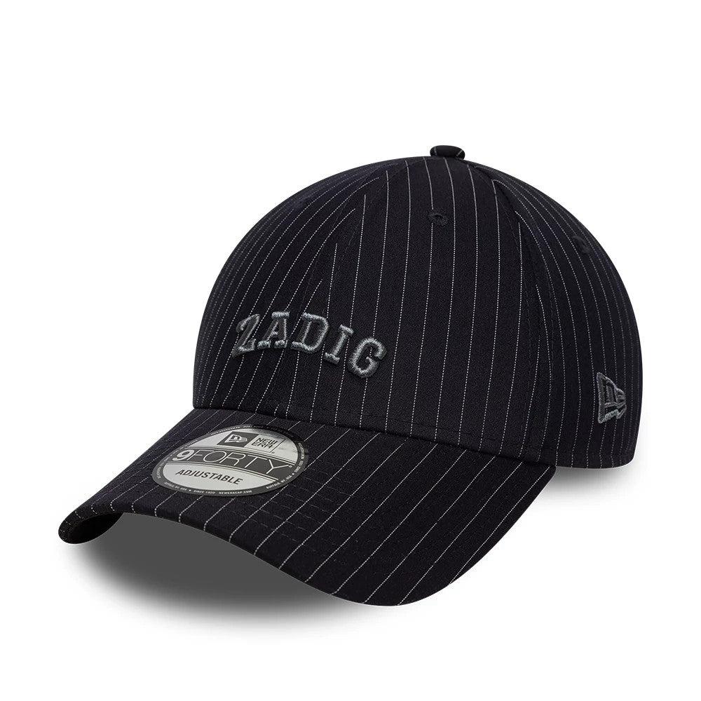 New Era X Zadig & Voltaire Navy 9FORTY Adjustable Cap, three-quarter view showing grey embroidered Zadig logo on front panel, navy pinstripe pattern, curved visor with 9FORTY size sticker, New Era flag logo on left side.