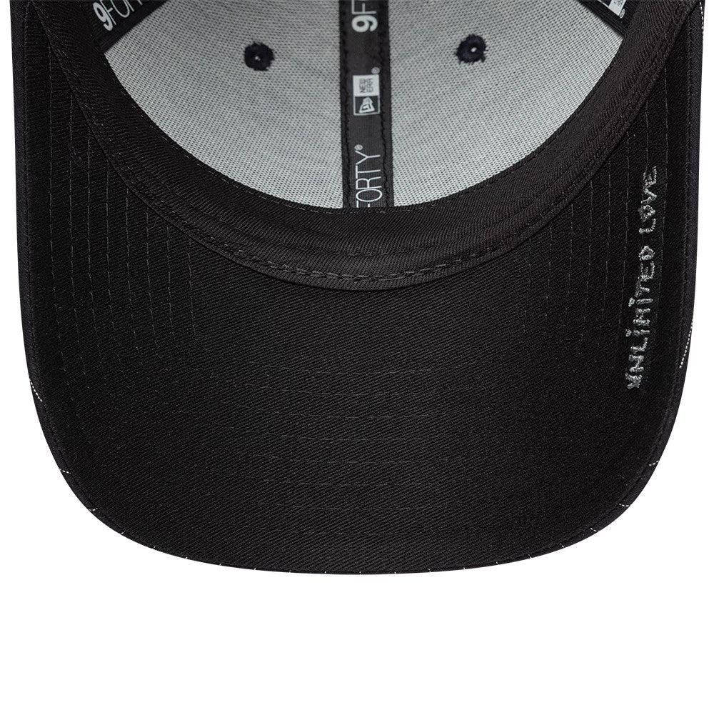 New Era X Zadig & Voltaire Navy 9FORTY Adjustable Cap, inside view showing the grey sweatband, black taping with 9FORTY branding, and navy undervisor with Zadig & Voltaire text on the edge.
