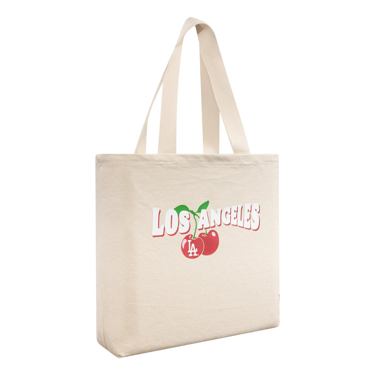 New Era LA Dodgers MLB Fruit Cream Tote Bag, three-quarter view showing the cream tote with dual handles and a colourful printed graphic of cherries with Los Angeles text and the LA logo on the front.