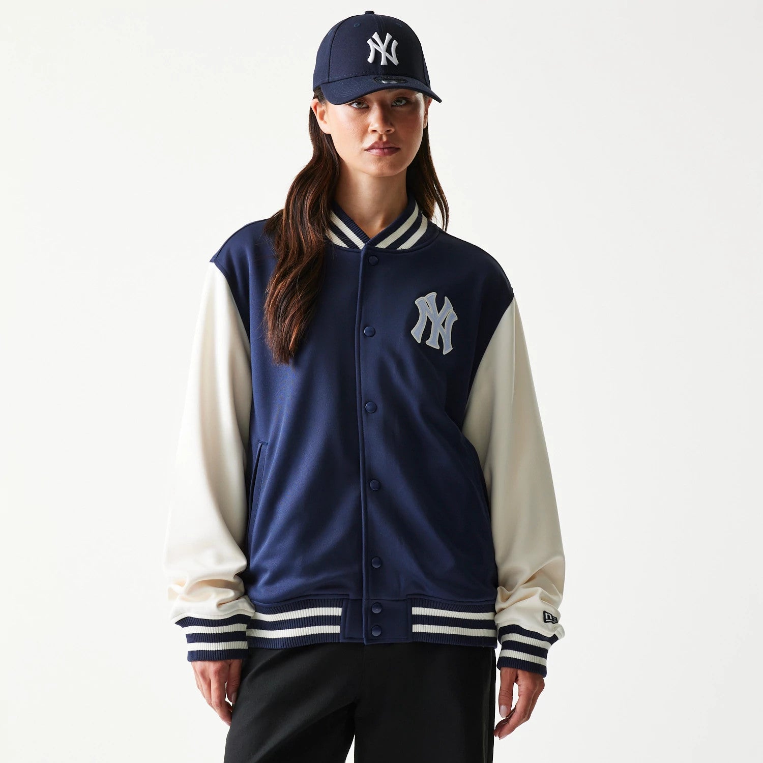 The model is wearing this MLB New York Yankees Bomber Jacket in navy. 4
