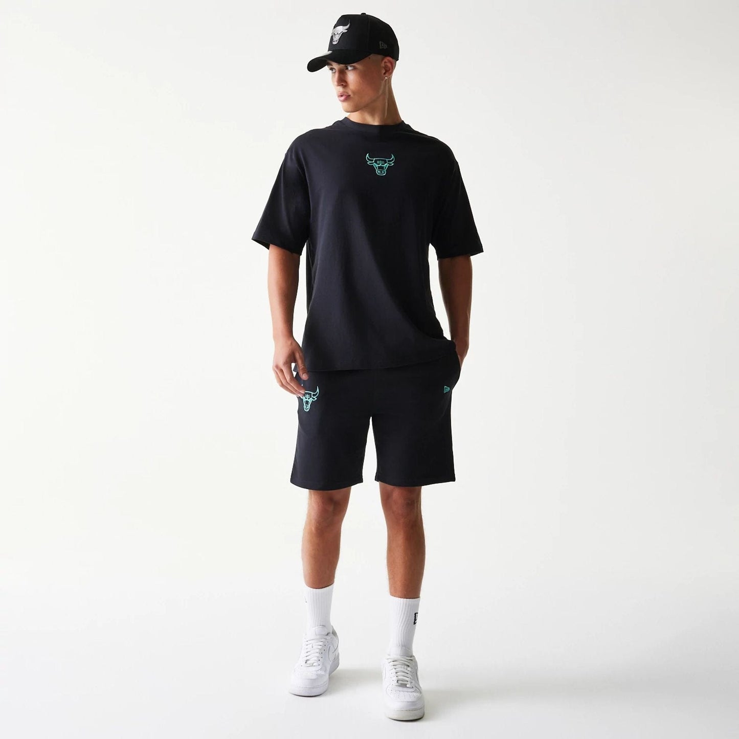 The model is wearing this NBA League Essential Chicago Bulls Shorts in black. 8