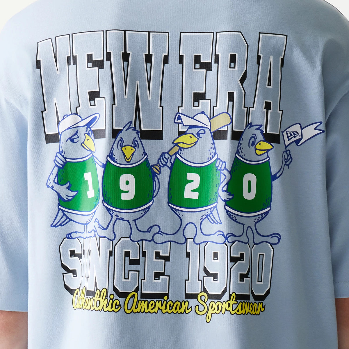 New Era Baseball Birds Character Graphic Blue Oversized T-Shirt, back view showing cartoon birds wearing jerseys with numbers, outlined NEW ERA lettering above, and Since 1920 stylised text below with Athletic American Sportswear caption.