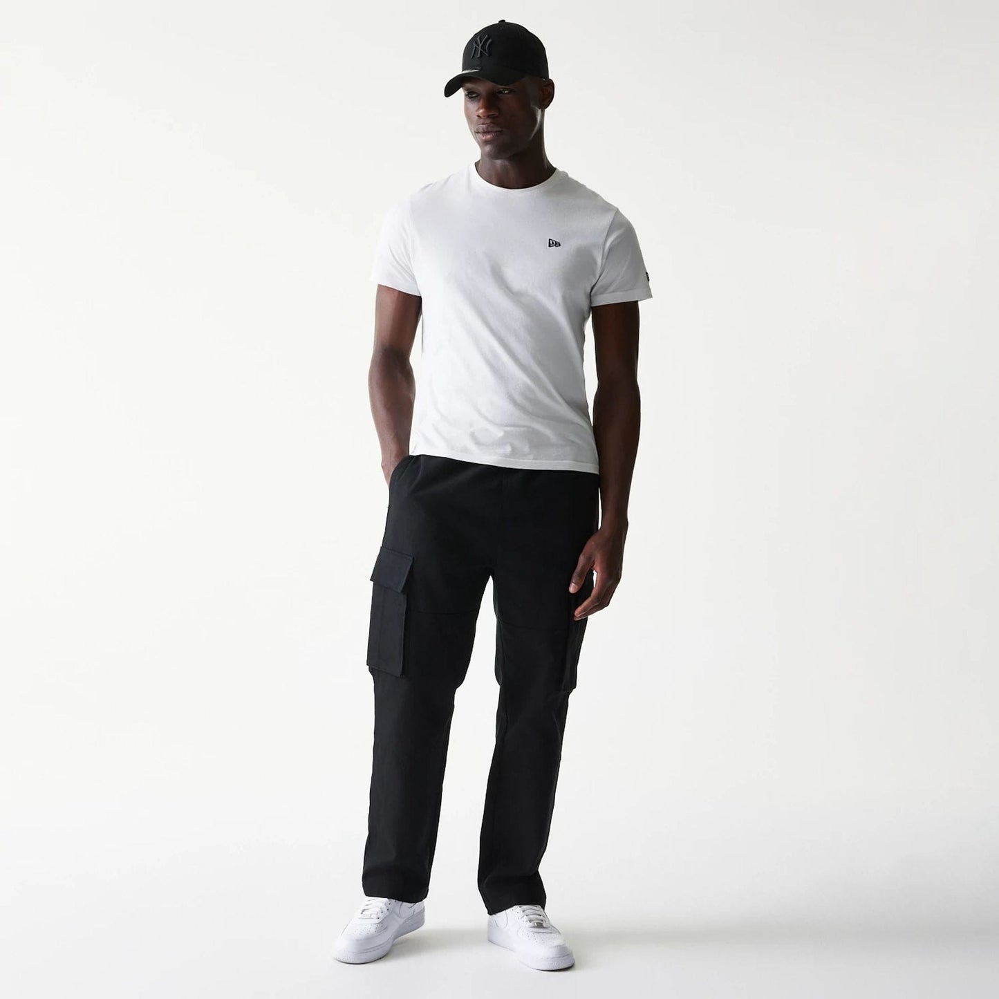 The model is wearing this New Era Straight Leg Cargo Joggers in black. 8