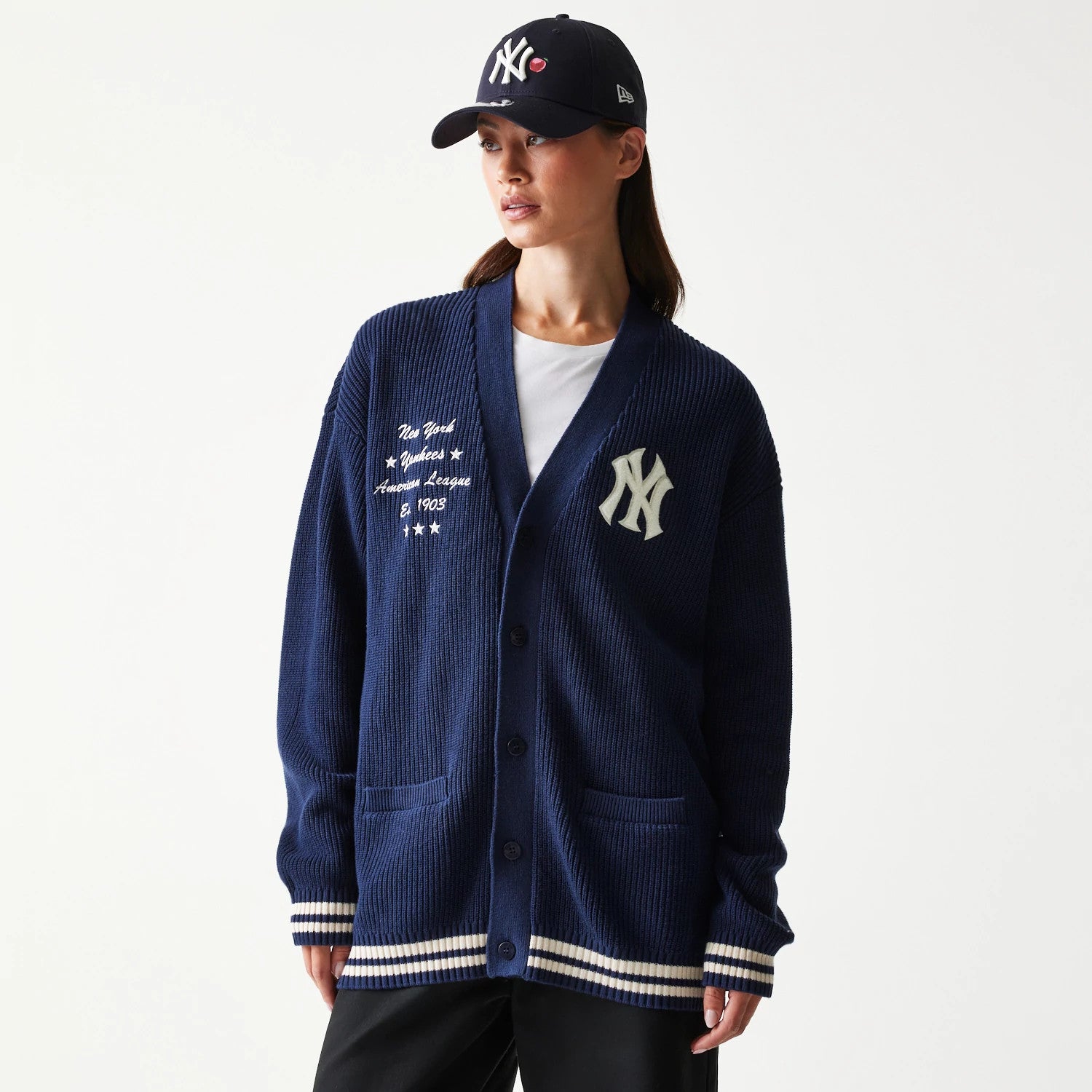 The model is wearing this MLB Collegiate New York Yankees Cardigan in navy. 4