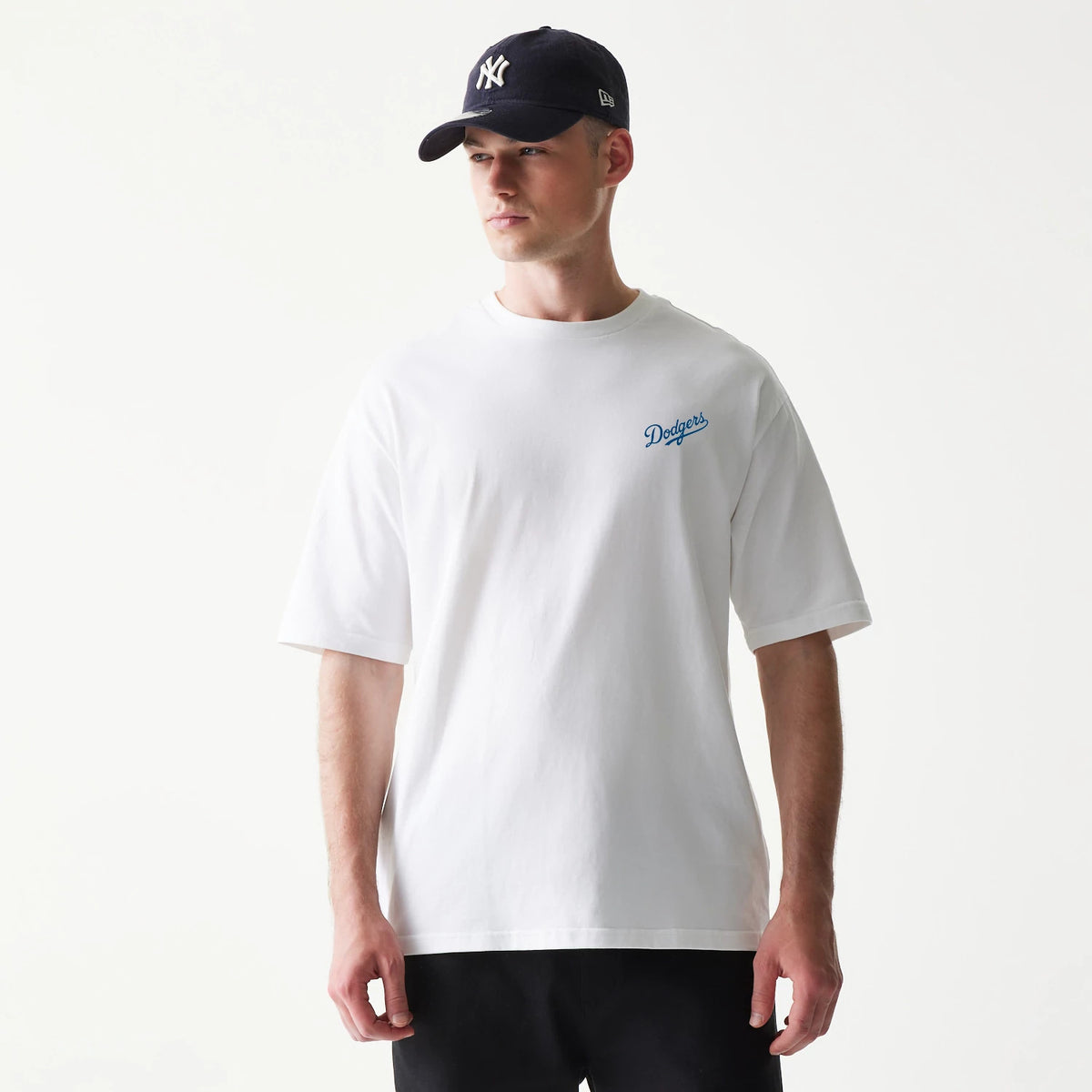 The model is wearing this MLB World Series LA Dodgers T-Shirt in white. 3