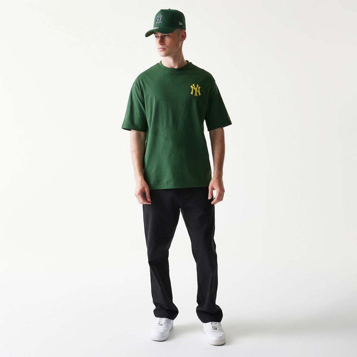 The model is wearing this MLB World Series New York Yankees T-Shirt in dark green. 8