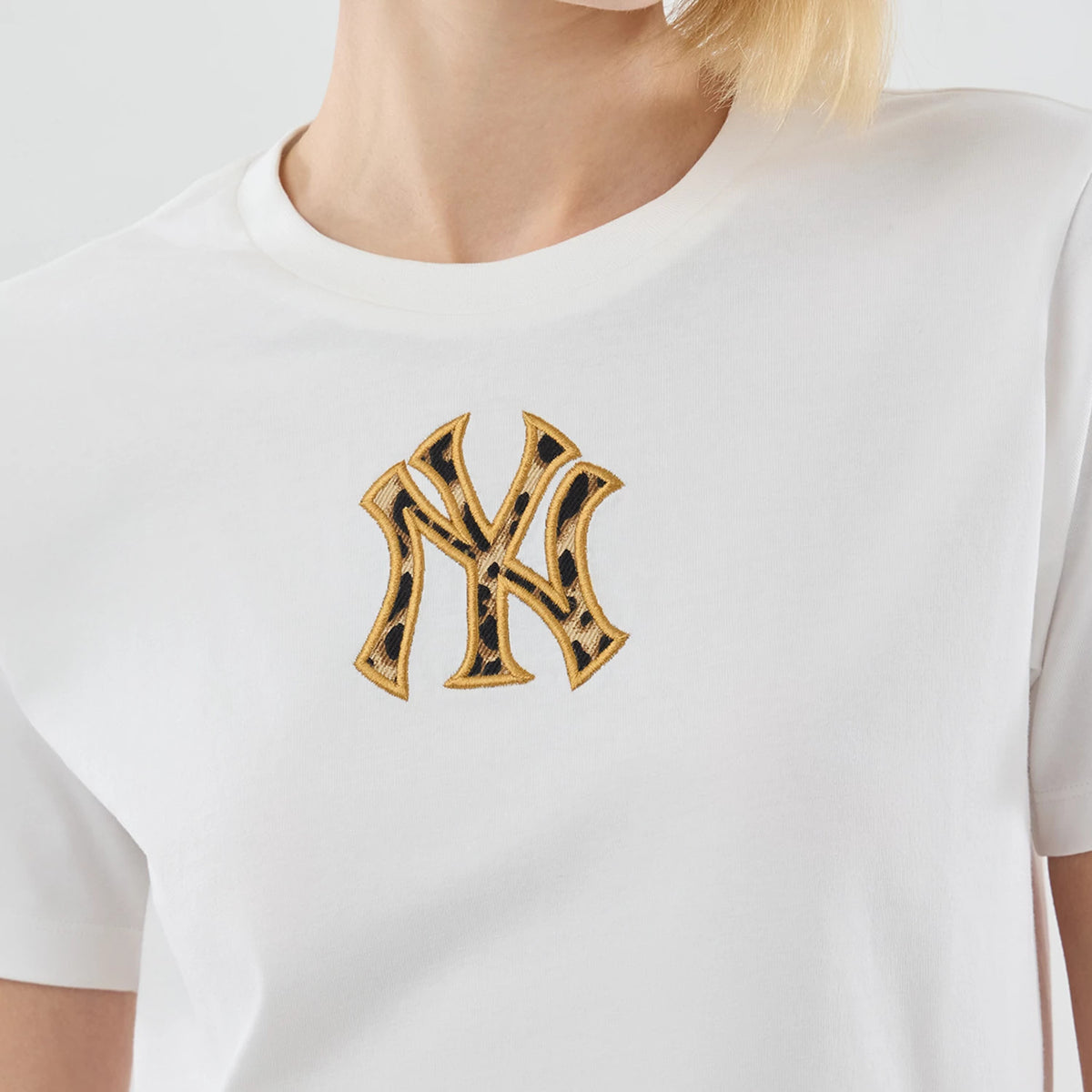 New Era New York Yankees Womens MLB Infill White T-shirt, front view showing the large black and gold embroidered team logo centred on the chest with short sleeves.