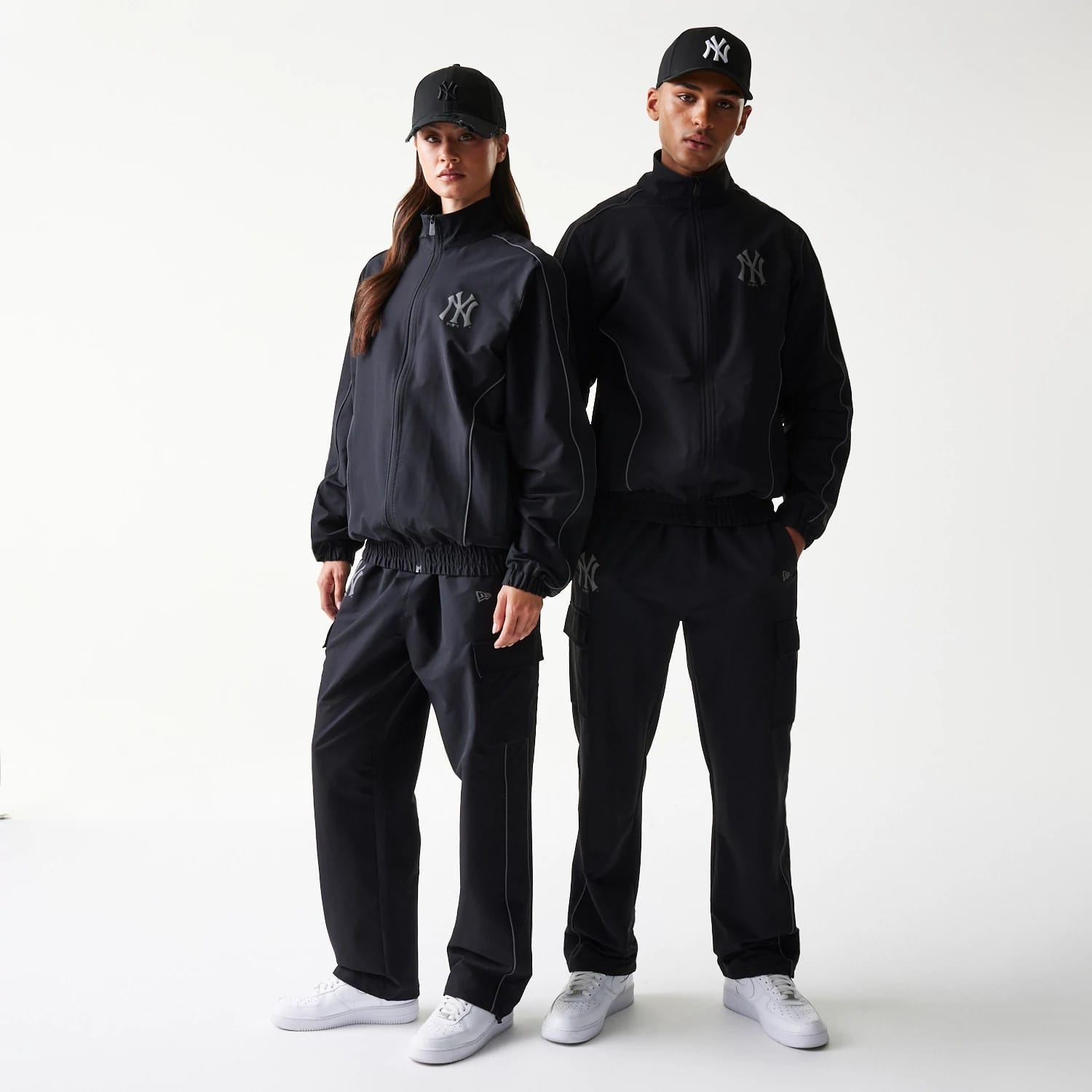 The model is wearing this MLB New York Yankees Track Jacket in black. 1