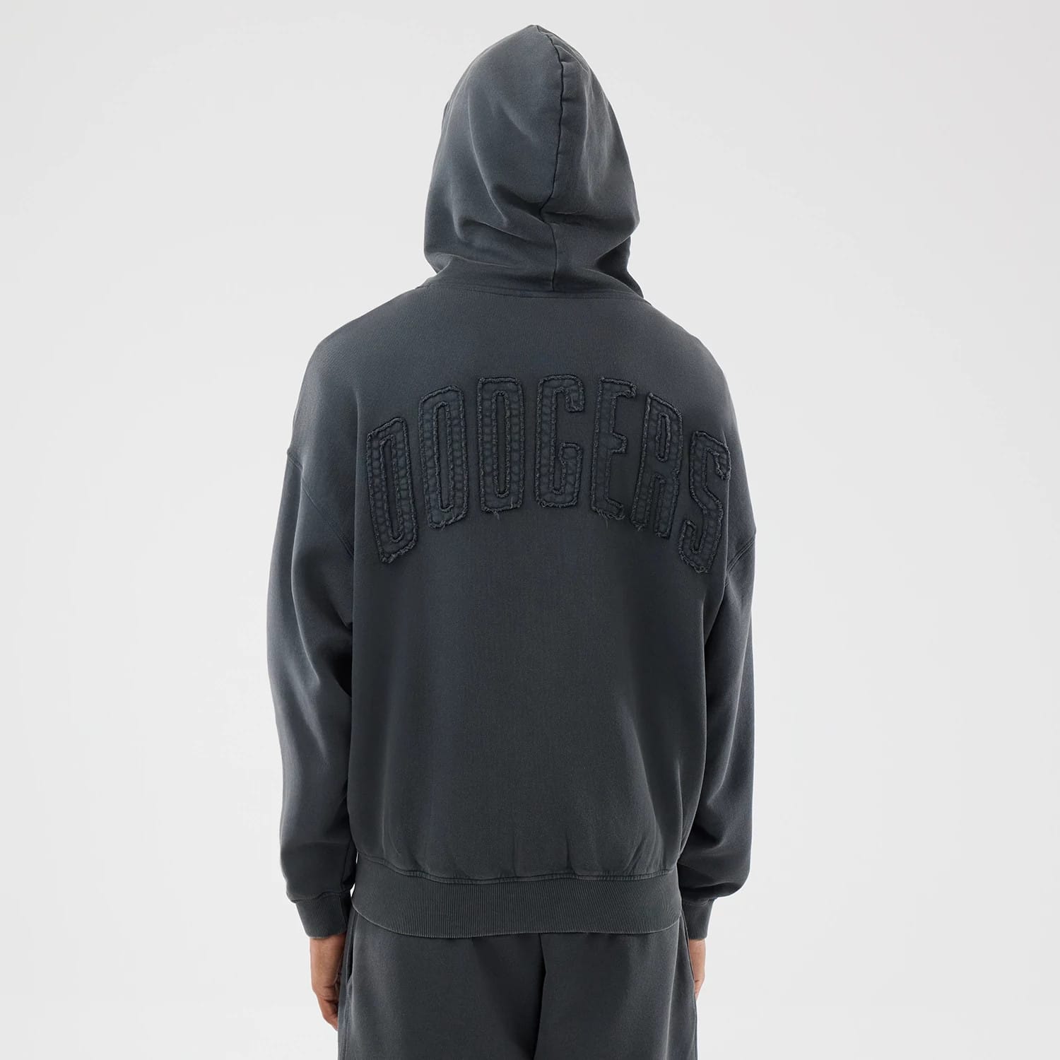 The model is wearing this MLB Washed LA Dodgers Full Zip Hoodie in Dark Grey. 2