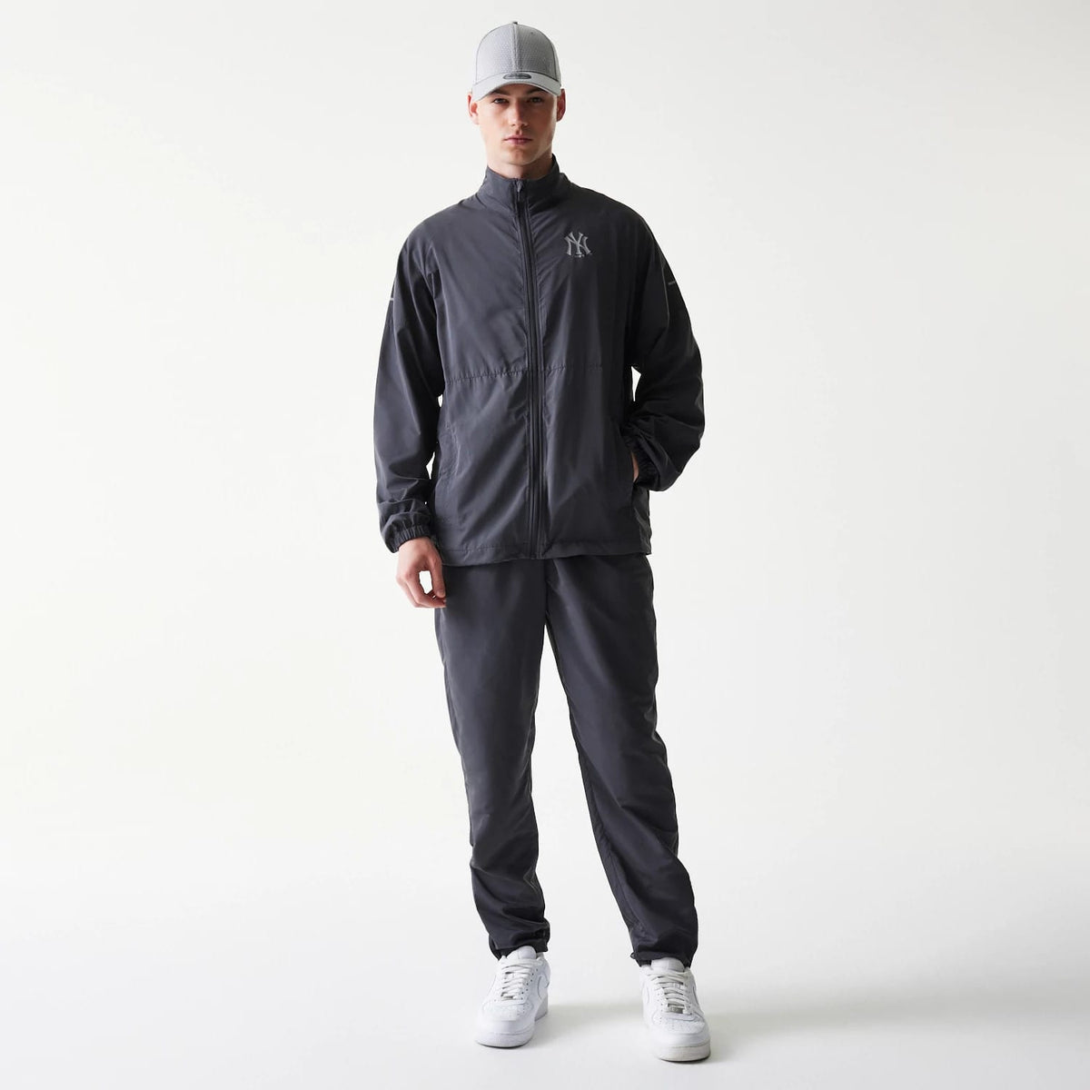 The model is wearing this MLB New York Yankees Jacket in dark grey. 8