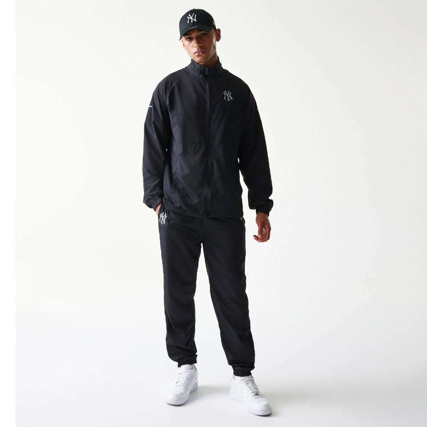 The model is wearing this MLB New York Yankees Jacket in black. 8