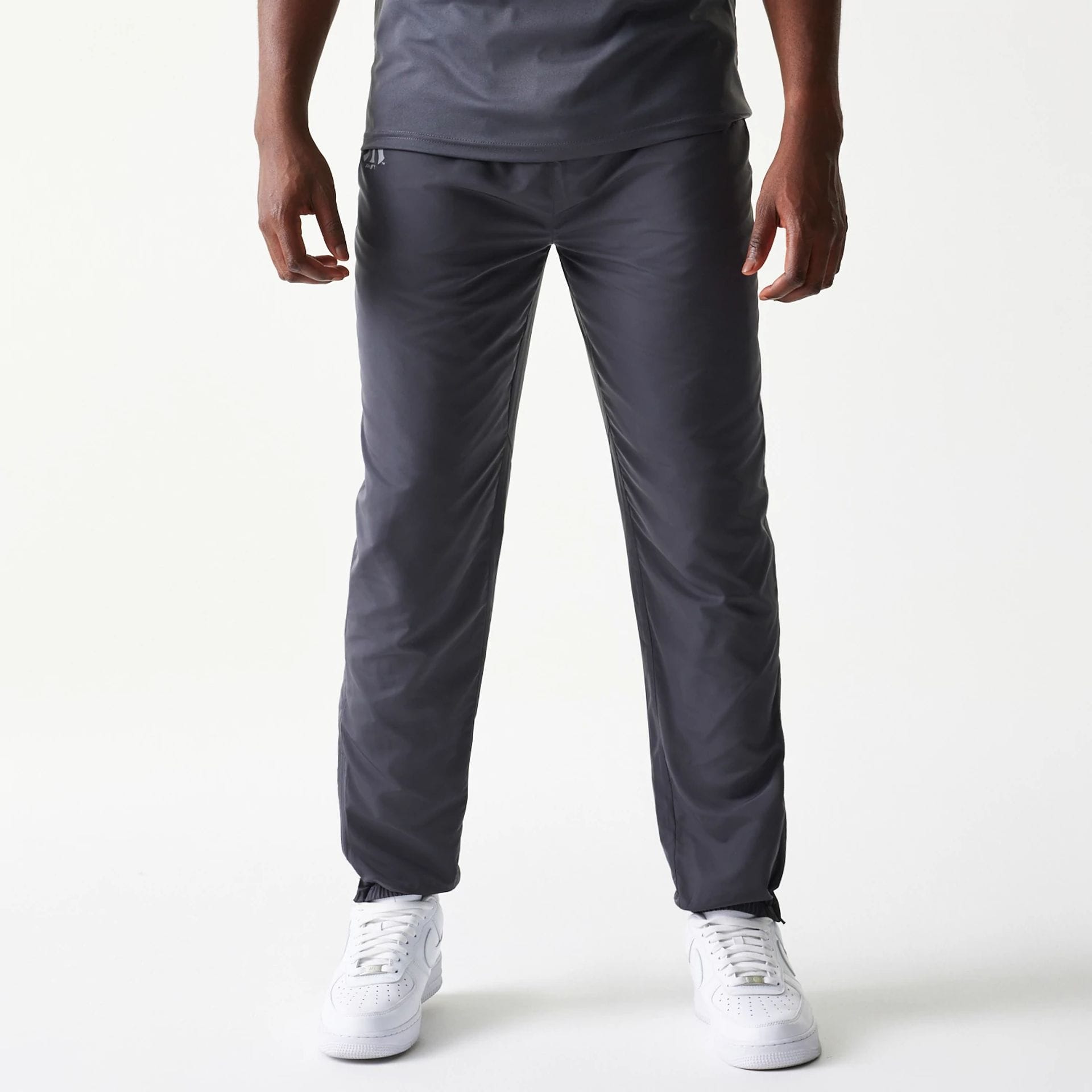 The model is wearing this MLB New York Yankees Track Pants in dark grey. 1