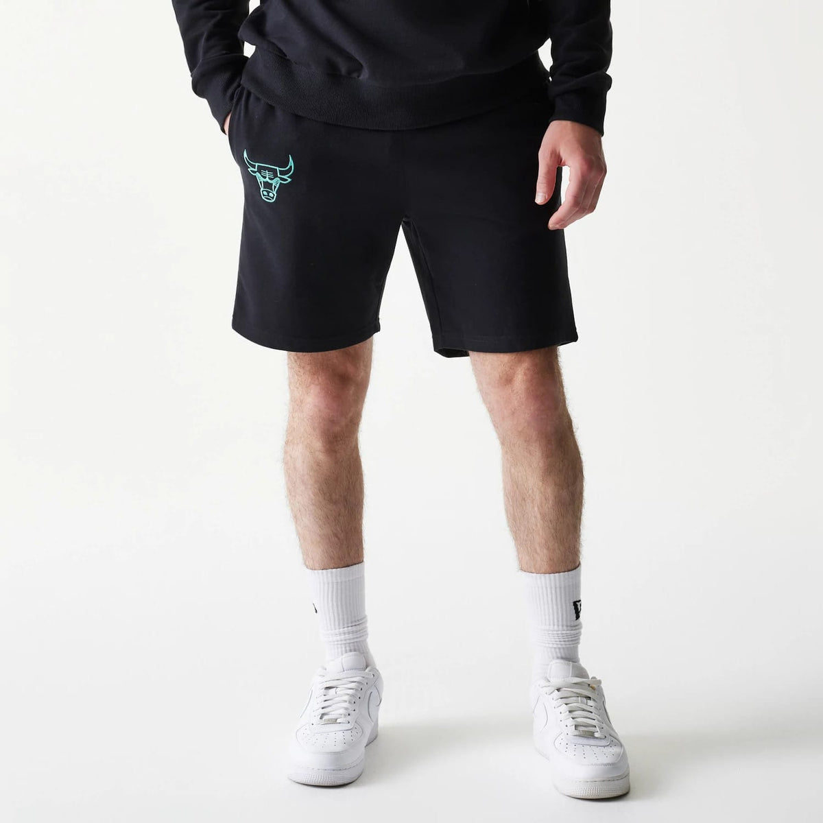 The model is wearing this NBA Core Chicago Bulls Shorts in black. 1